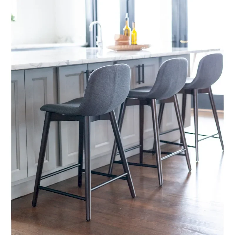 Upholstered Solid Wood Counter Stool With Footrest by East at Main