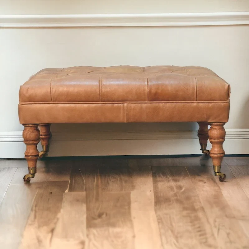 Solid Wood Ottoman with Buffalo Tan Leather Upholstery and Castor Legs