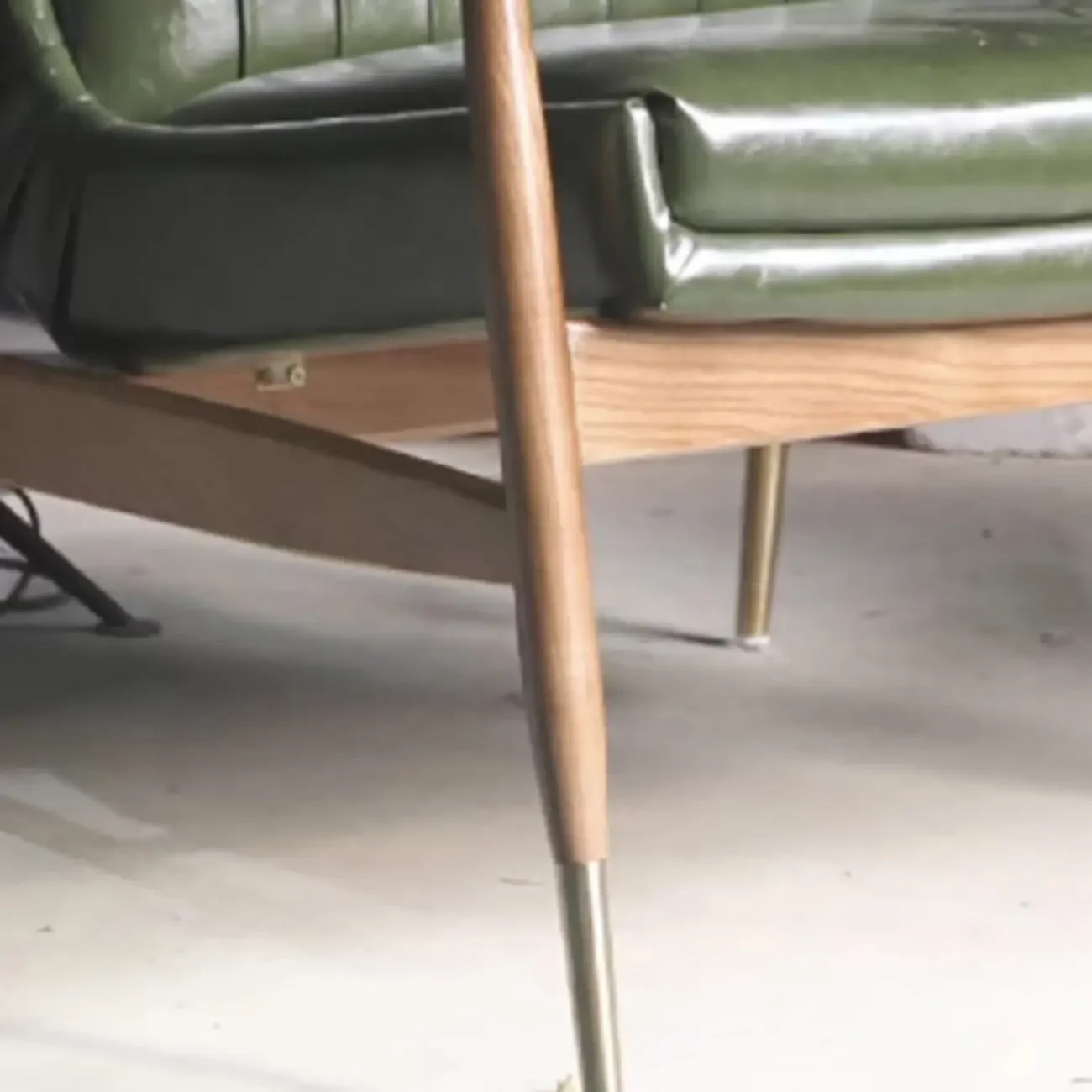 Modern Green Leather Armchair with High Back Design