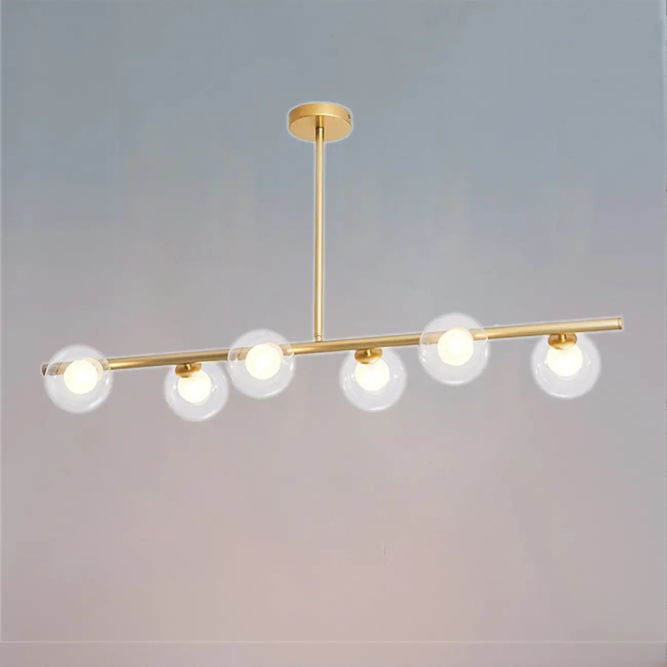 Gold Linear Island Light with 6 Lights Transparent Glass Globe Shades