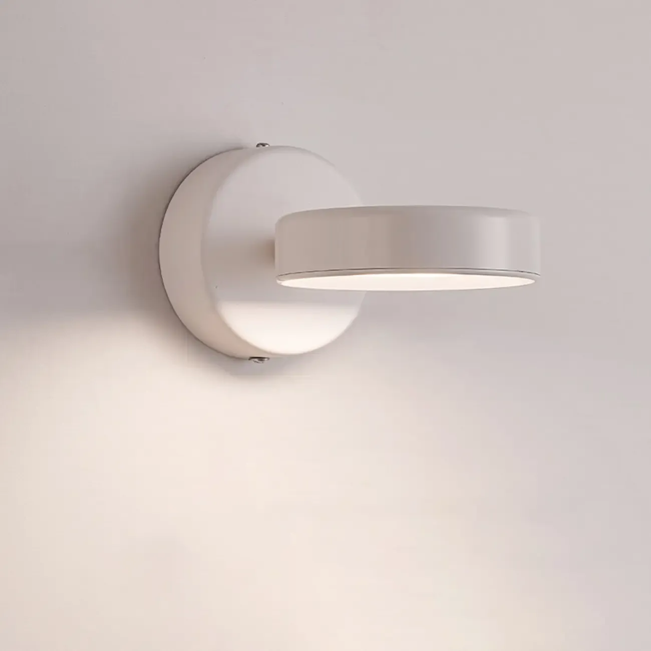Modish Rotating Circular Chrome Wall Sconce