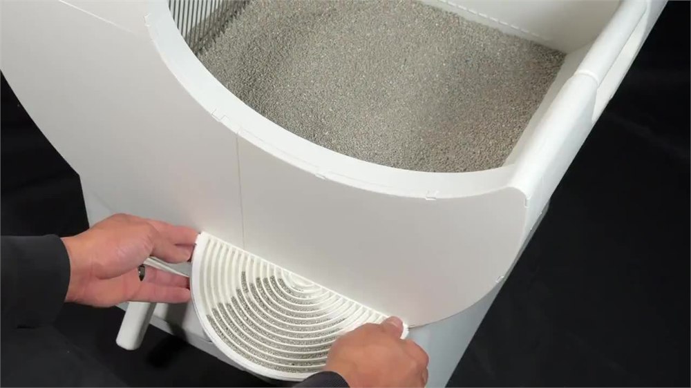 Removable sifting grate on the litter box