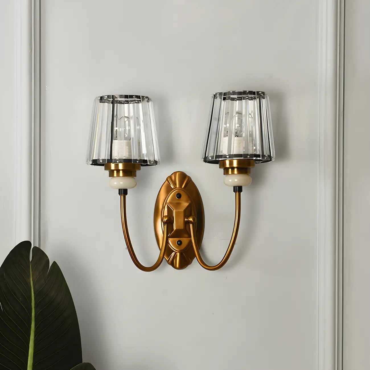 Elegant Brass Wall Sconce with Crystal Shade