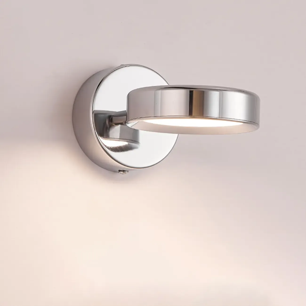Modish Rotating Circular Chrome Wall Sconce