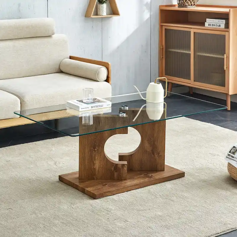 A rectangular modern and fashionable coffee table with tempered glass tabletop and white MDF legs