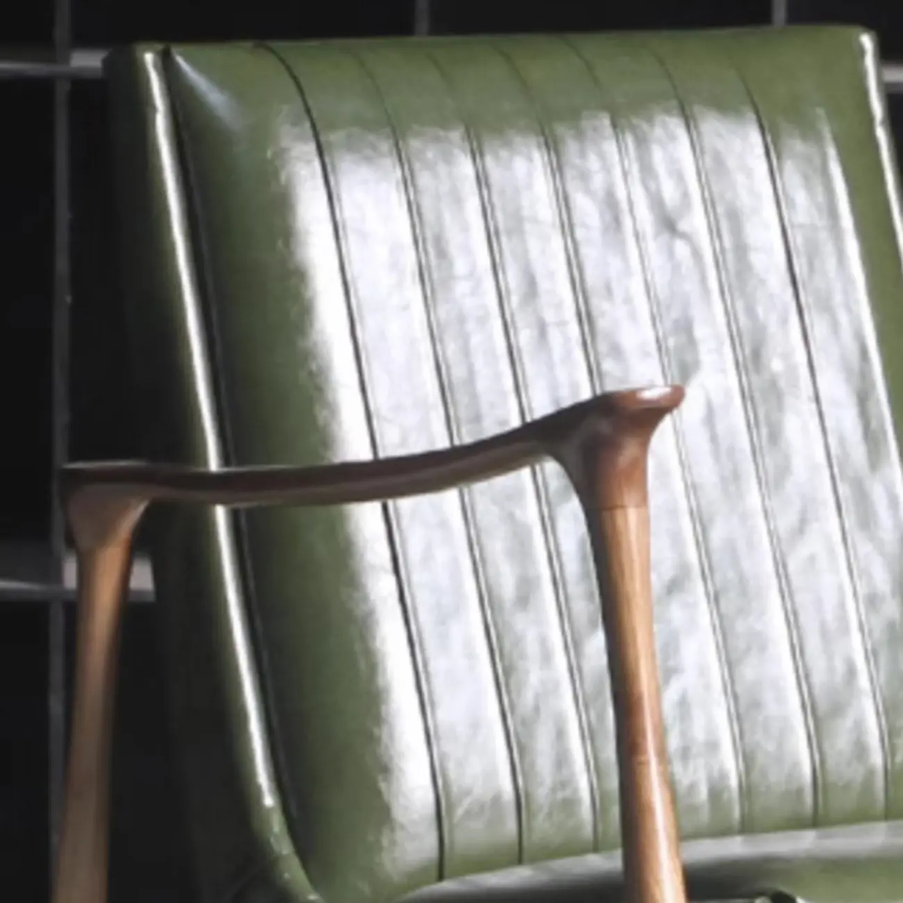 Modern Green Leather Armchair with High Back Design