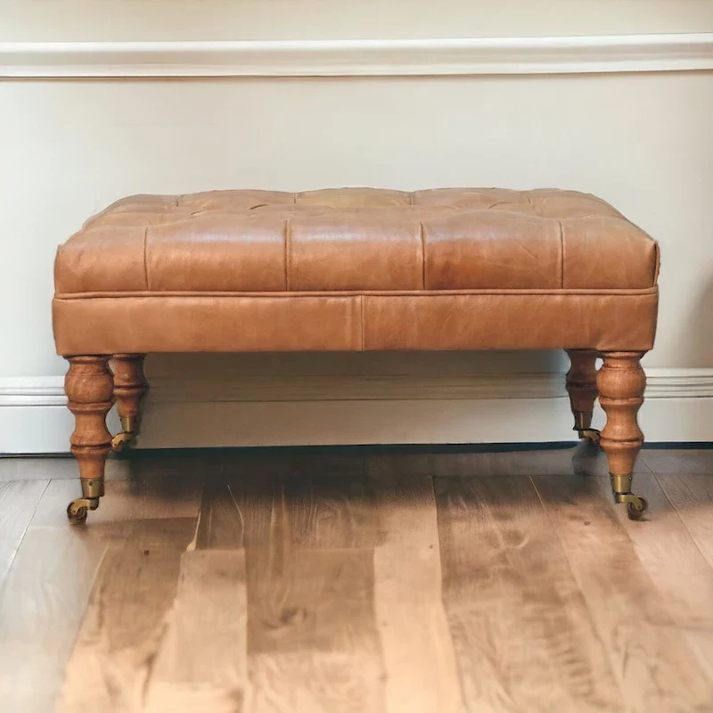Solid Wood Ottoman with Buffalo Tan Leather Upholstery and Castor Legs