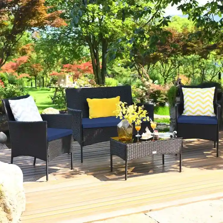 4 Pieces Patio Rattan Cushioned Sofa Set with Tempered Glass Coffee Table - 24 x 23.5 x 33 (L x W x H)