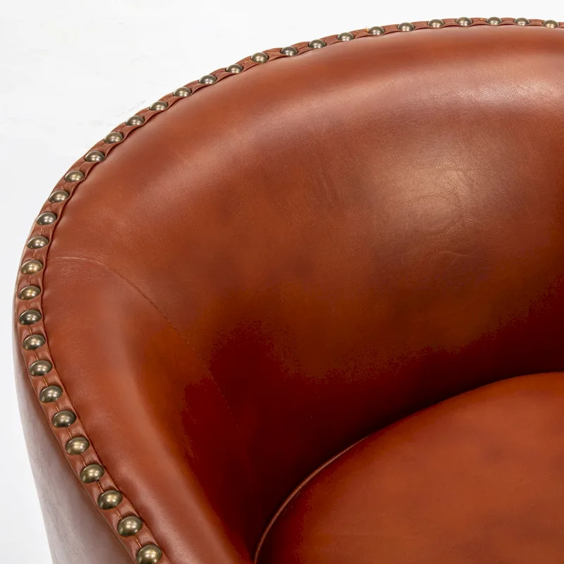 Truman Faux Leather Swivel Arm Chair with Nailhead Trim by Greyson Living