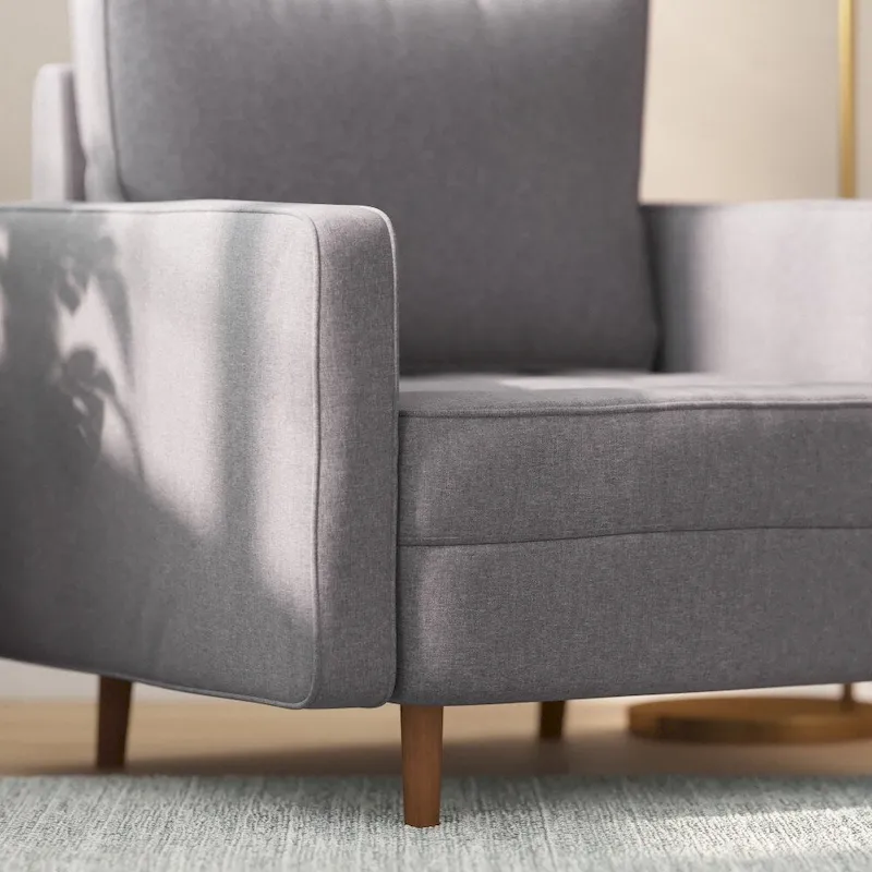 Compact Upholstered Tufted Chair with Wooden Legs