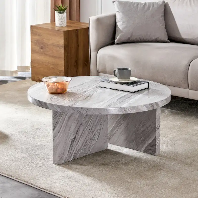 A white MDF material circular patterned coffee table suitable for small spaces and living rooms.