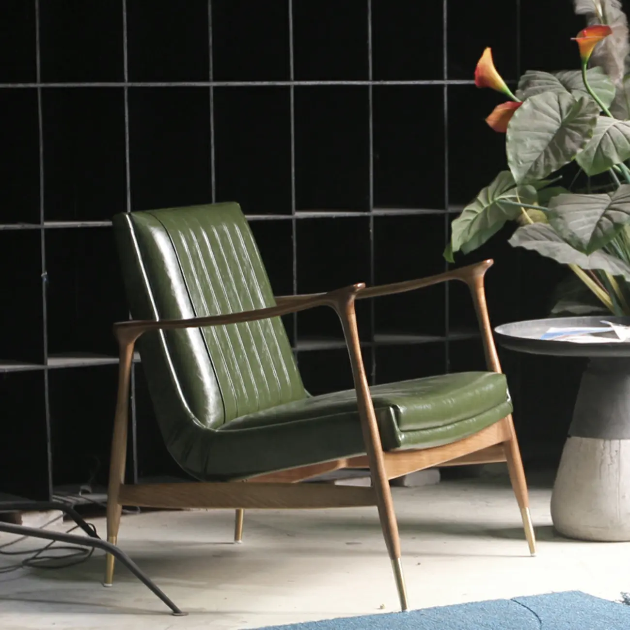 Modern Green Leather Armchair with High Back Design