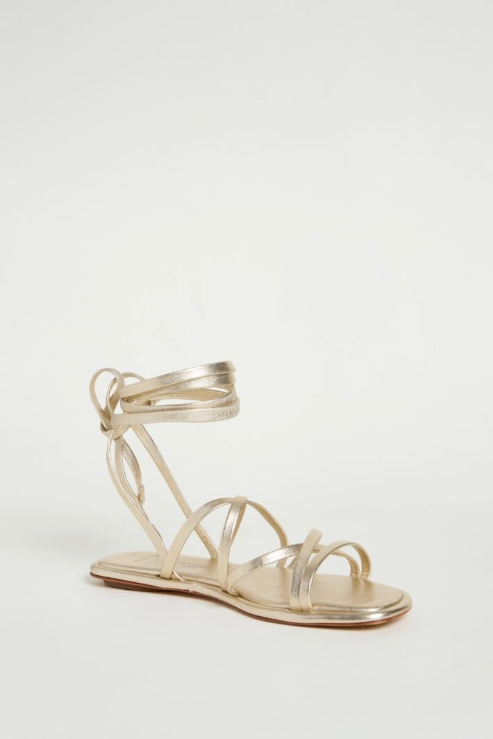 Laminated nappa leather flat sandals - GOLD