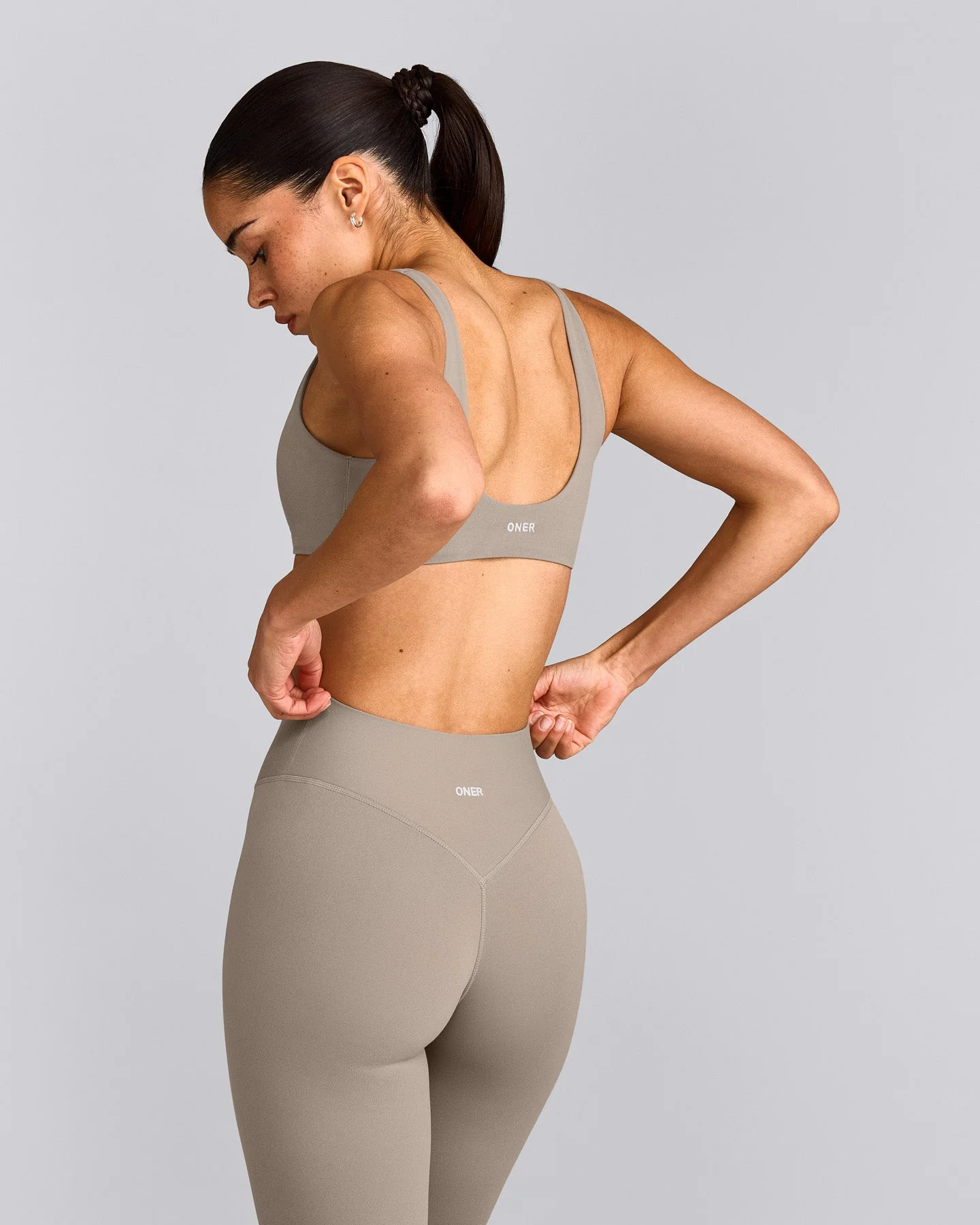 SoftMotion™ Scoop Back Bralette with White Logo | Warm Sand