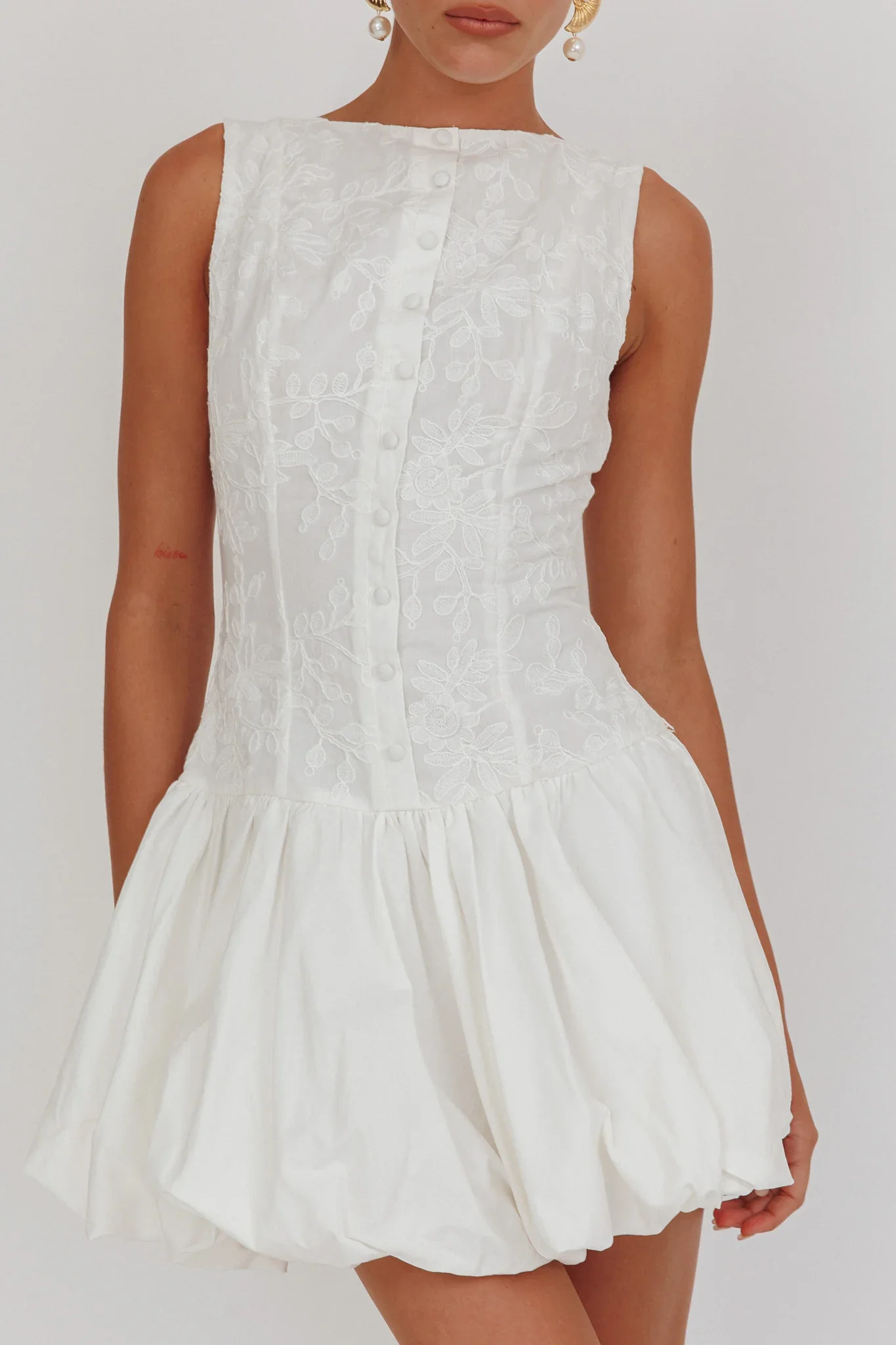 Opulent Sleeveless Bubble Hem Mini Dress Embroidered White