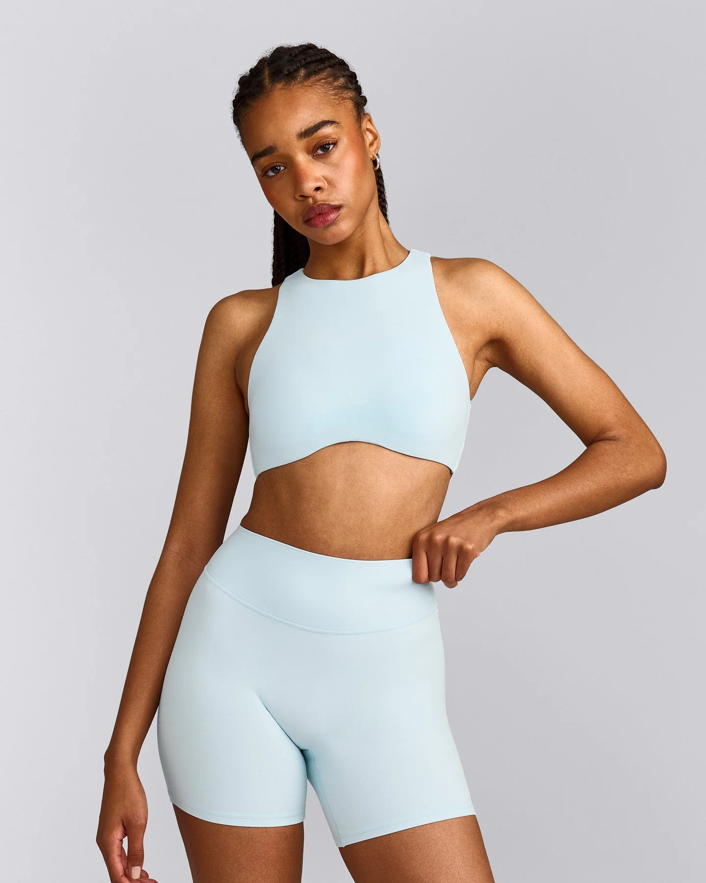 SoftMotion™ High Neck Sports Bra with Grey Logo | Cloud Blue