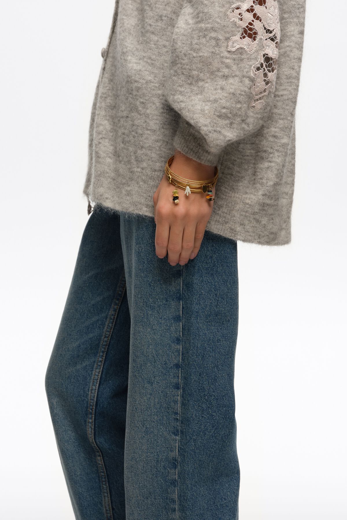 Bangle bracelet with aged gold stones texture