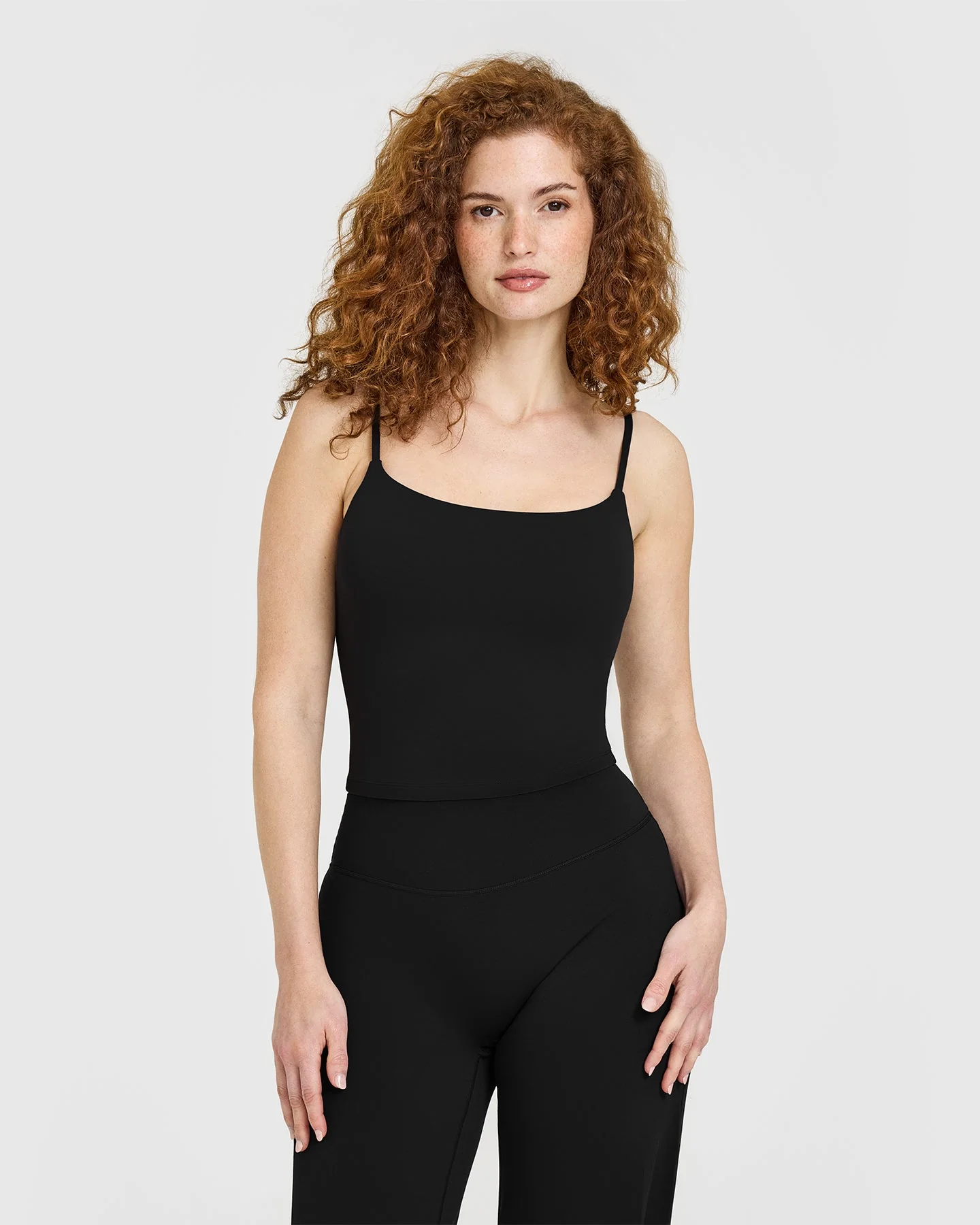 SoftMotion™ Strappy Mid Vest with Built in Bra Shelf with White Logo | Black