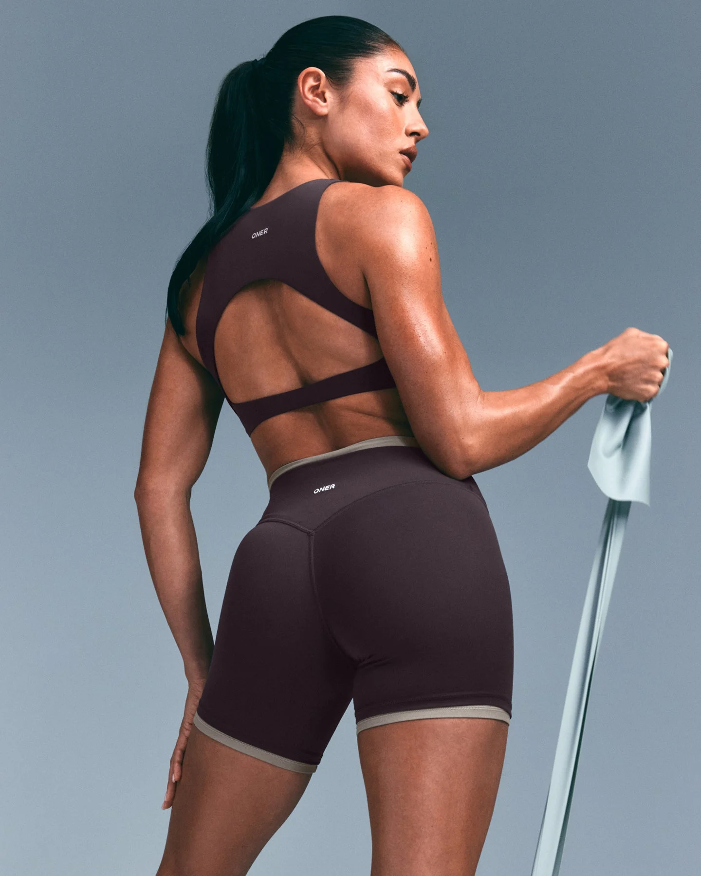 SoftMotion™ High Neck Sports Bra with Grey Logo | Dark Umber Brown