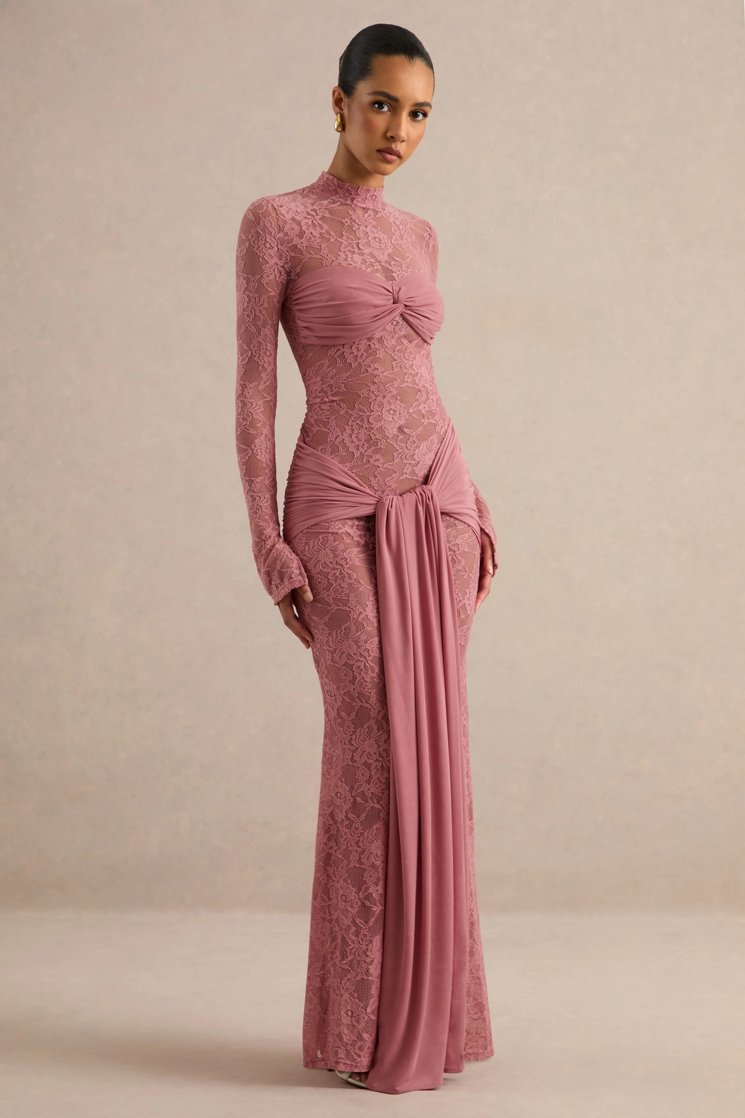 Akira | Blush Sheer Lace High Neck Long Sleeve Maxi Dress With Gathered Detailing And Sash
