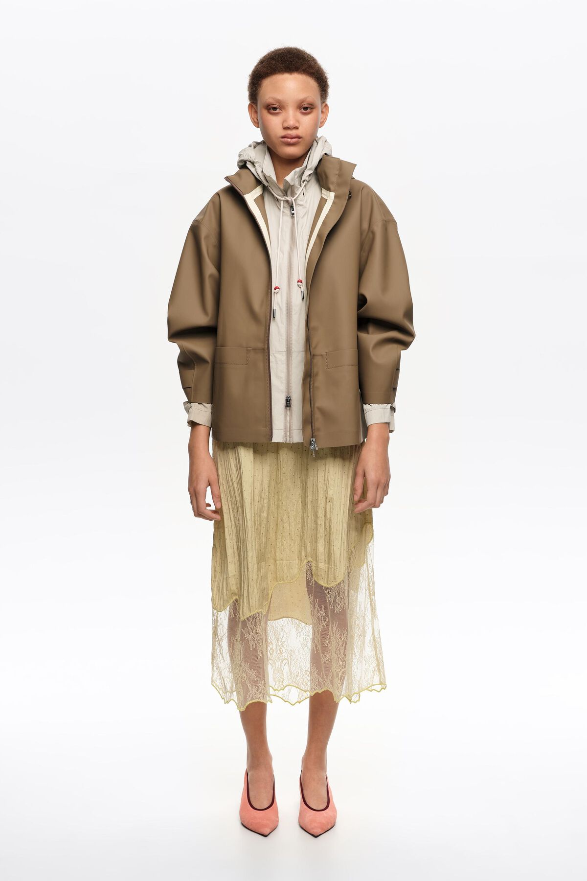 Dark camel rubberized A-line trench