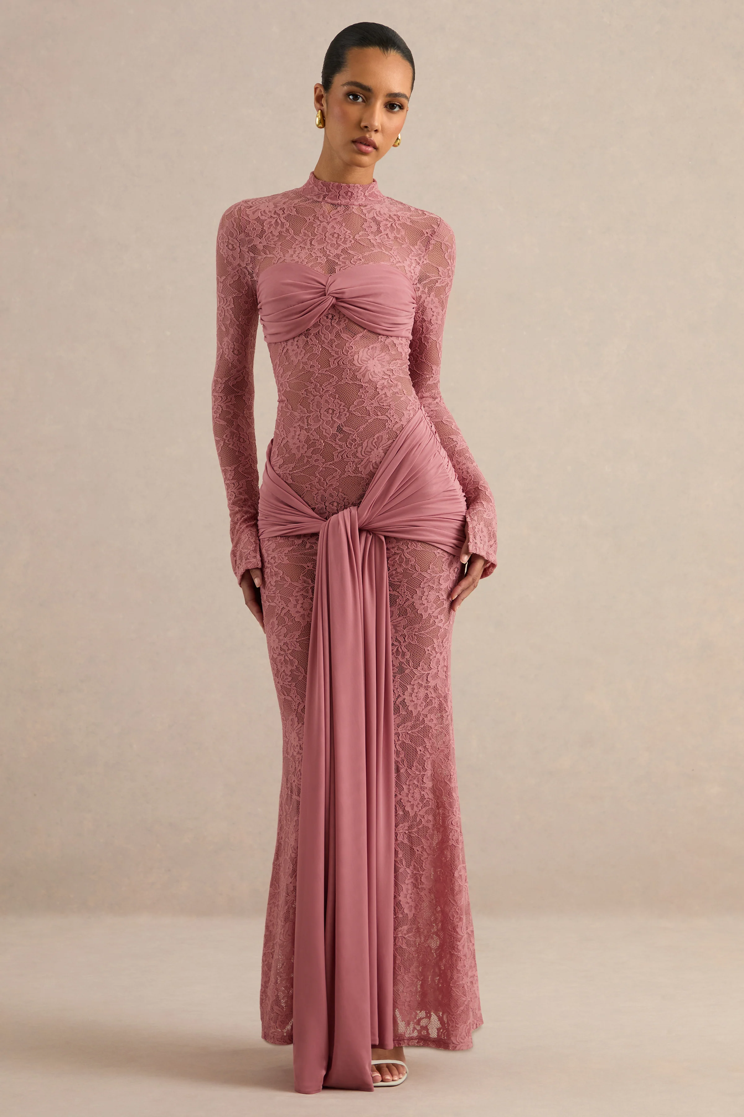 Akira | Blush Sheer Lace High Neck Long Sleeve Maxi Dress With Gathered Detailing And Sash