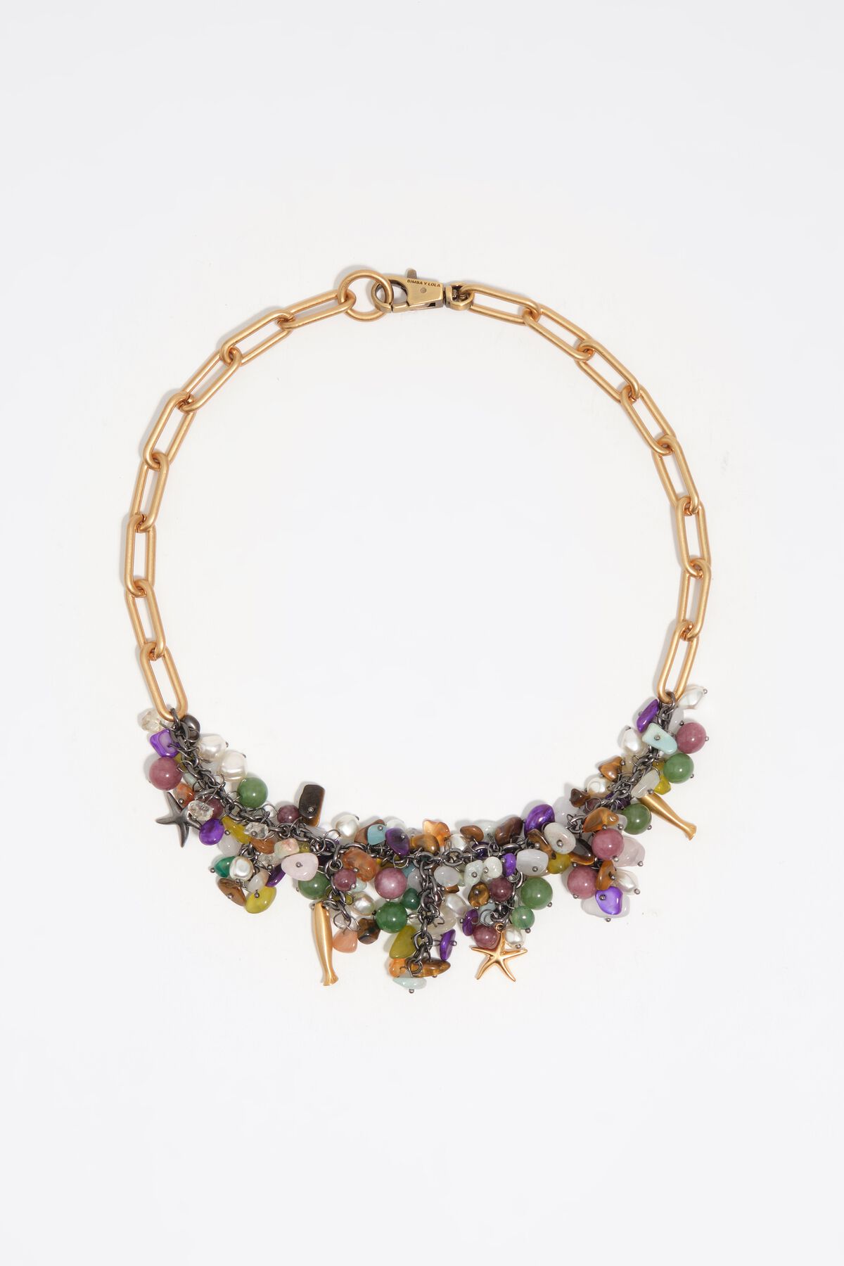 Aged gold necklace with stones and fish