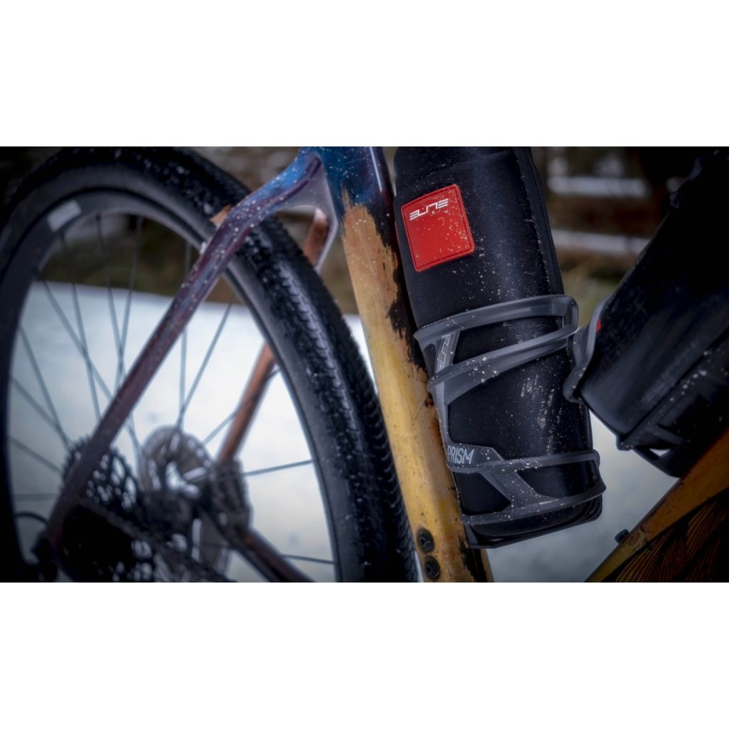 Elite Prism Carbon Bottle Cage - Left - glossy / gold white
