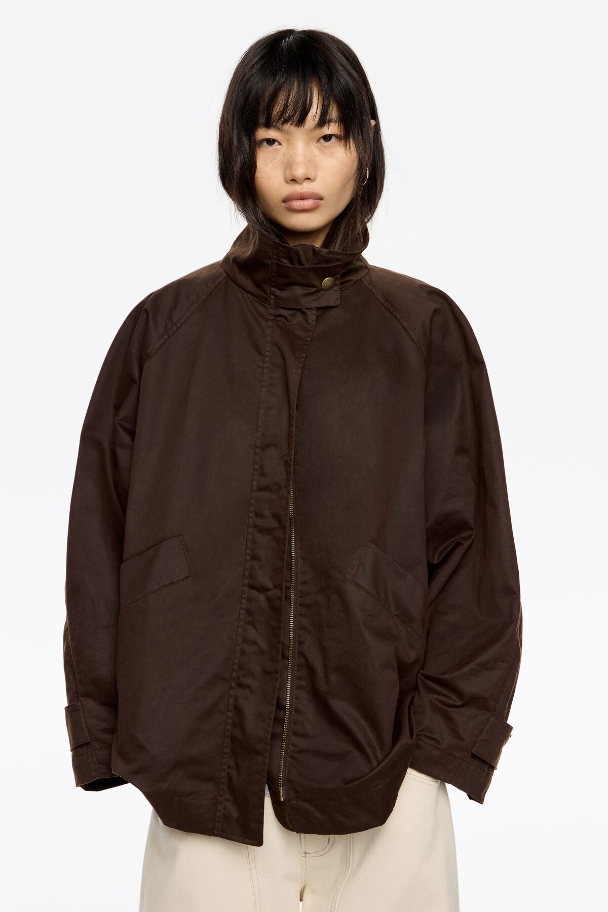 Dark brown coated A-line trench