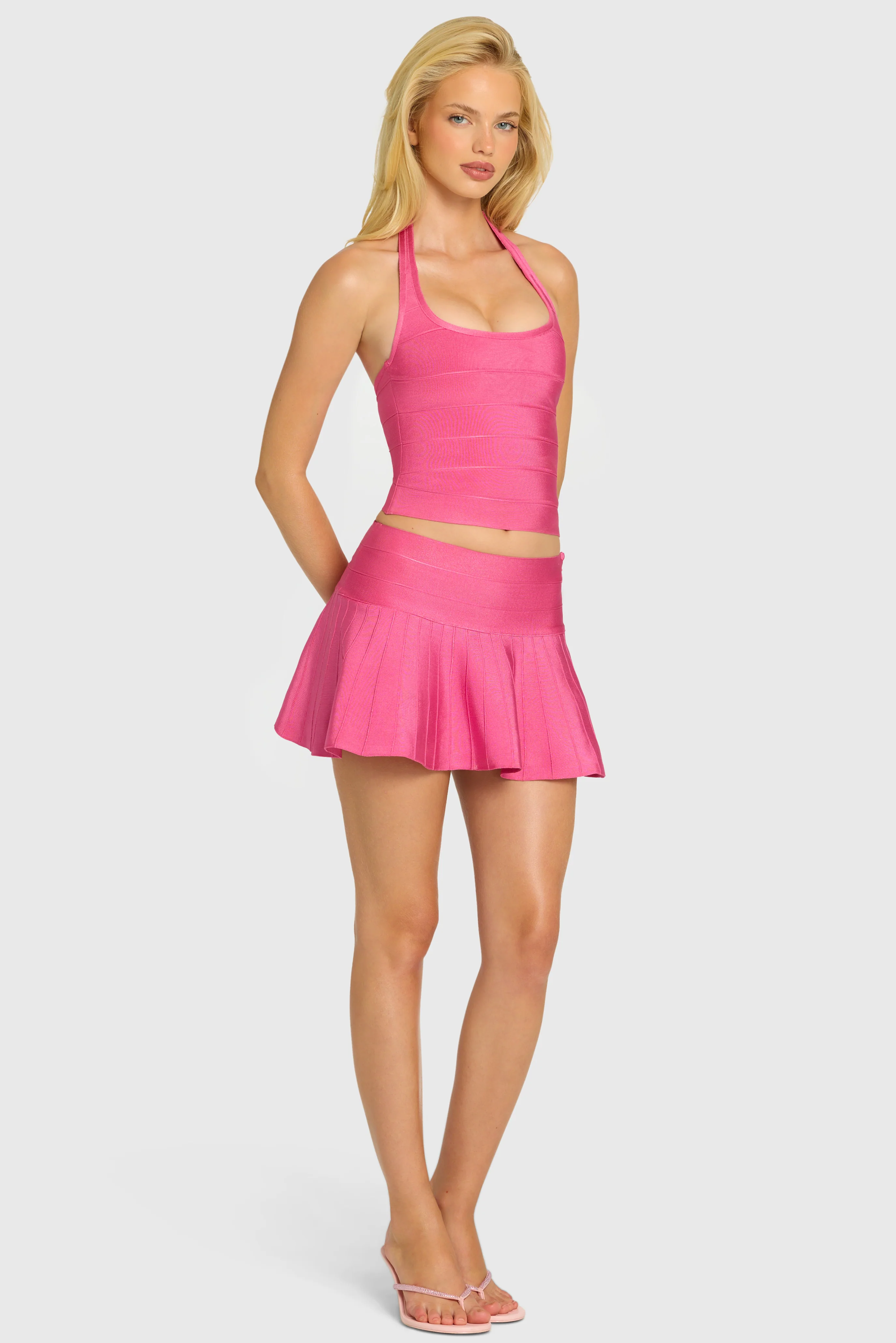 Bandage Low-Rise Mini Skirt in Raspberry