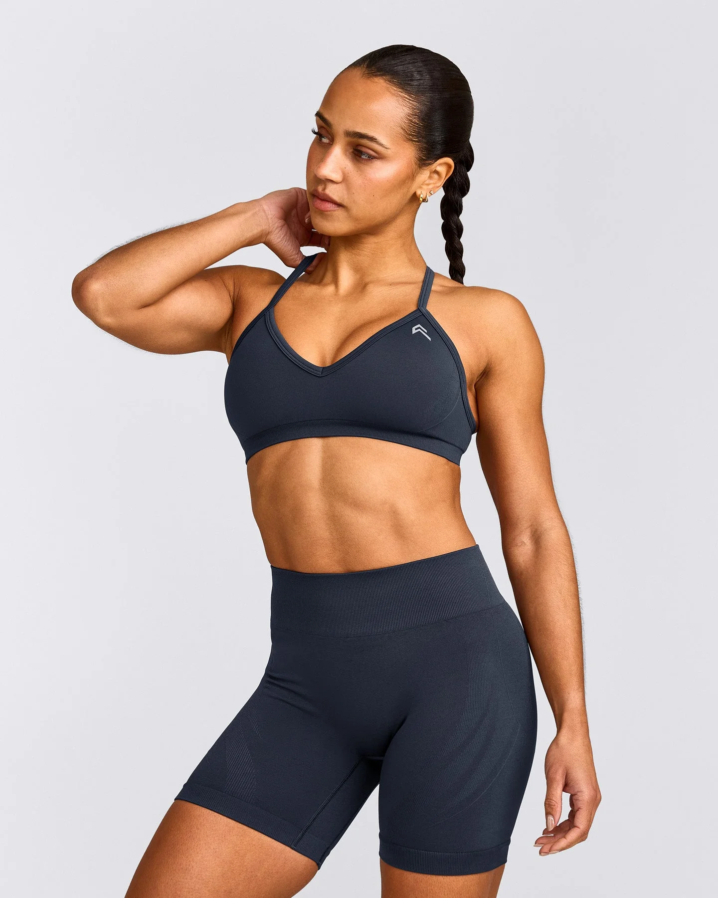 EnhanceLift™ Seamless Strappy Sports Bra with Grey Logo | True Blue