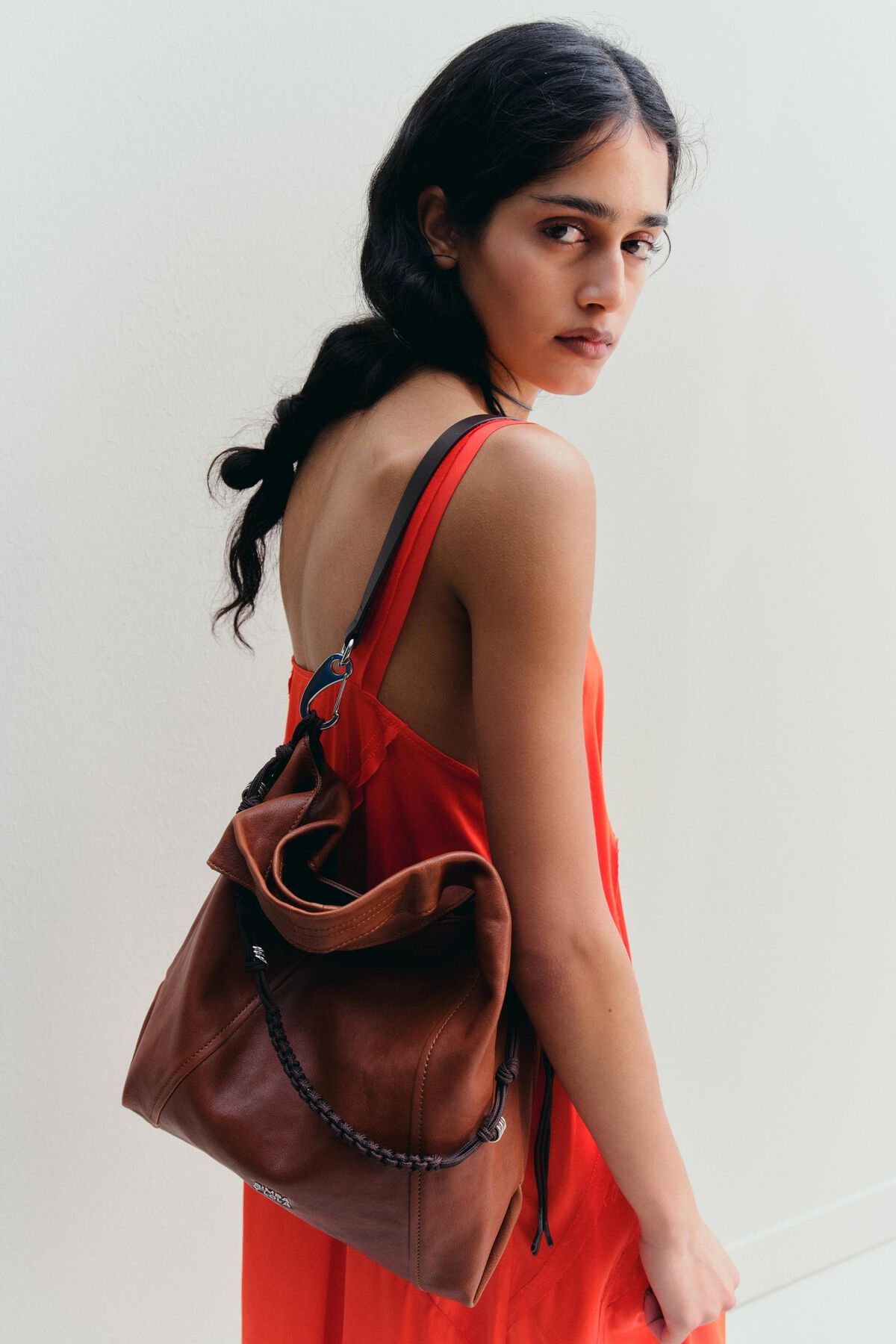 Medium dark tan leather Paper bag