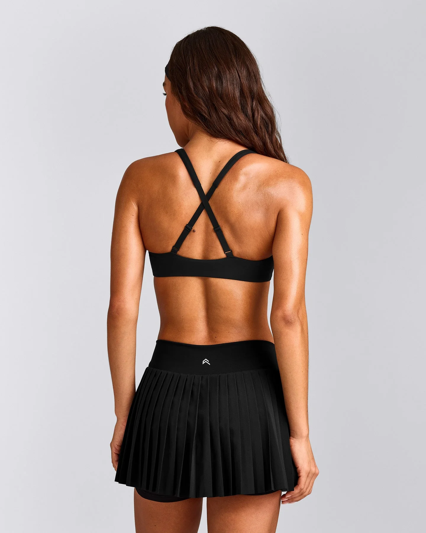 EasyLift™ Cross Back Sports Bra with Grey Logo | Black