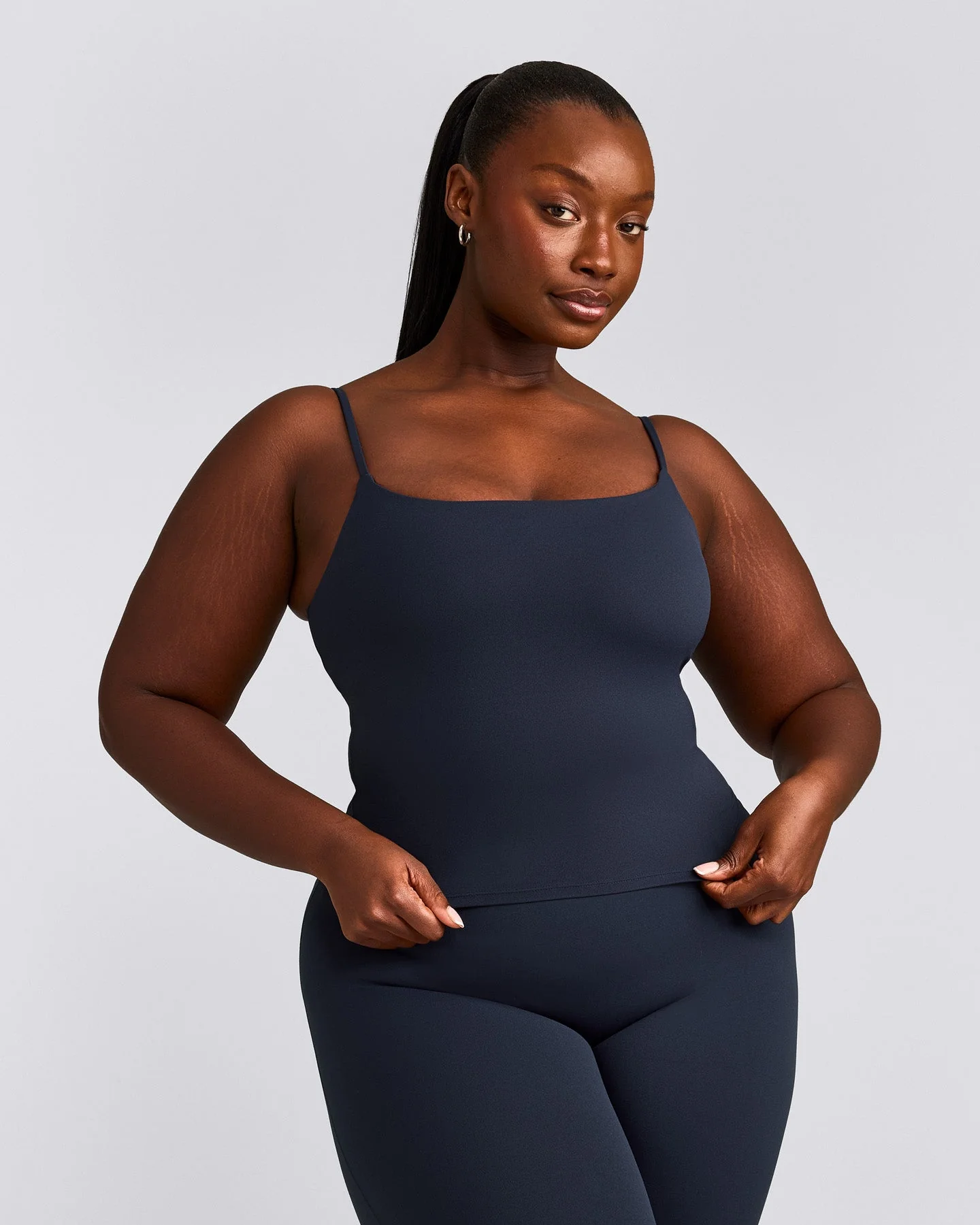 SoftMotion™ Strappy Mid Vest with Built in Bra Shelf with Grey Logo | True Blue