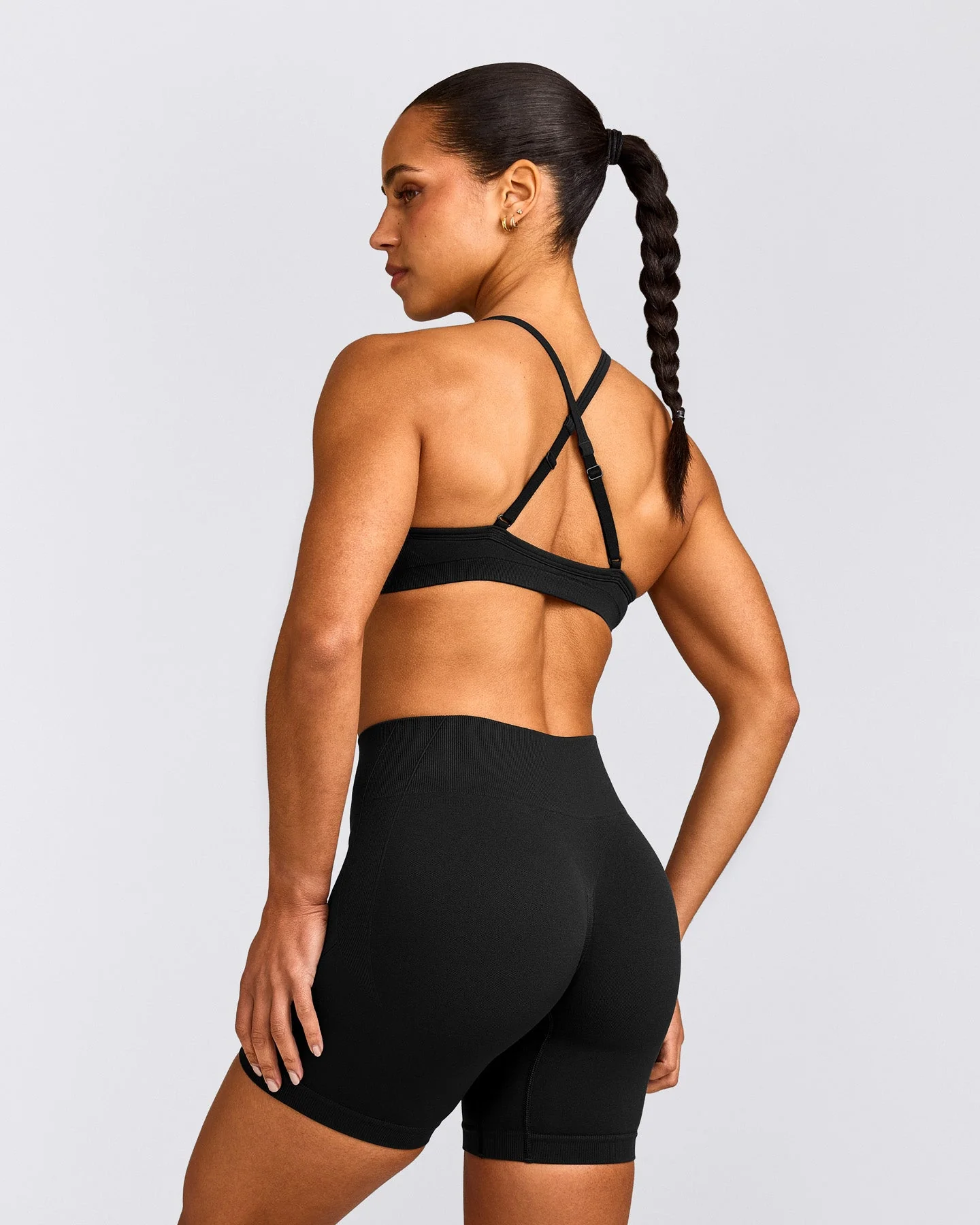 EnhanceLift™ Seamless Strappy Sports Bra with Grey Logo | Black