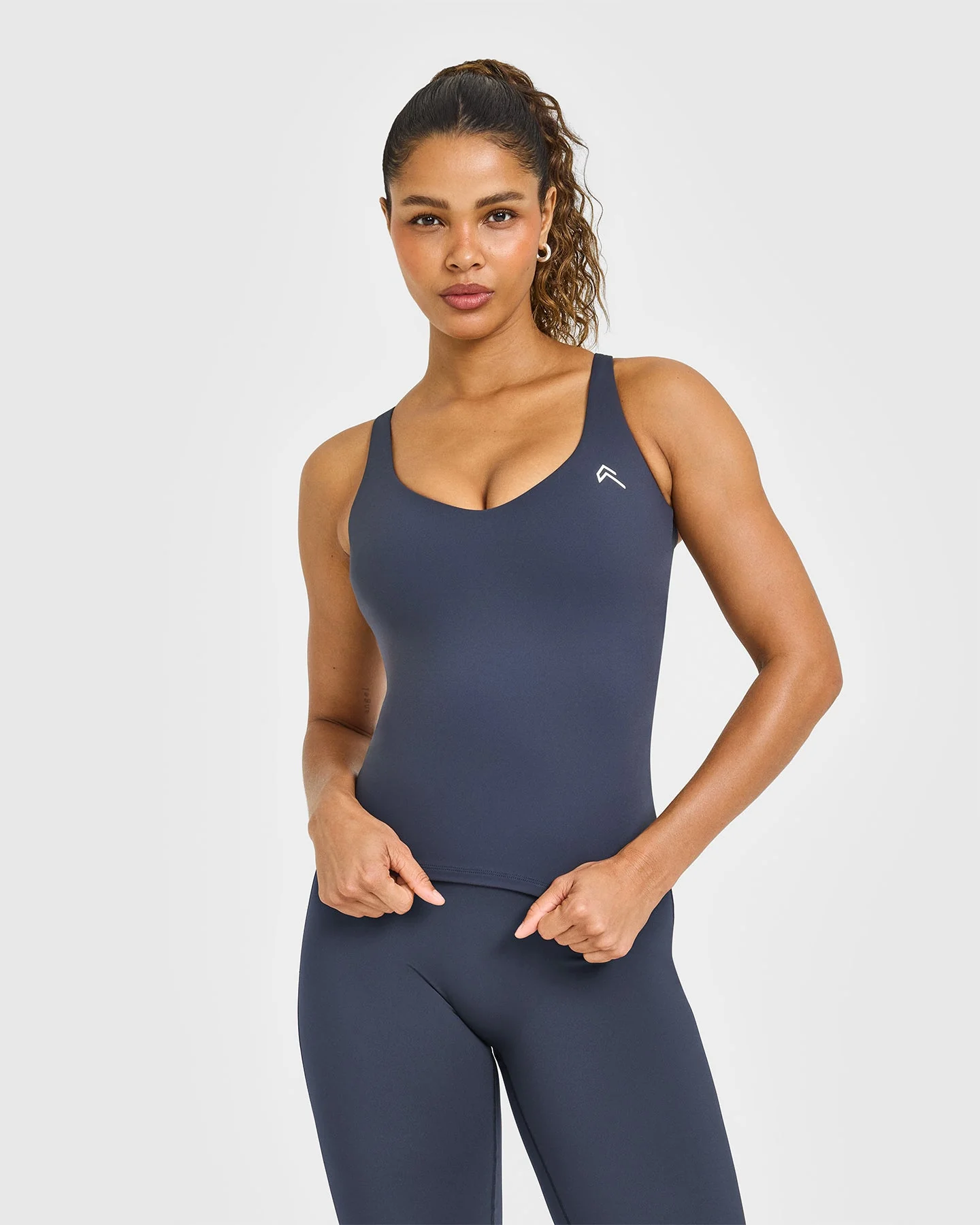 UnifiedMove™ V Neck Cross Back Vest White Logo | True Blue