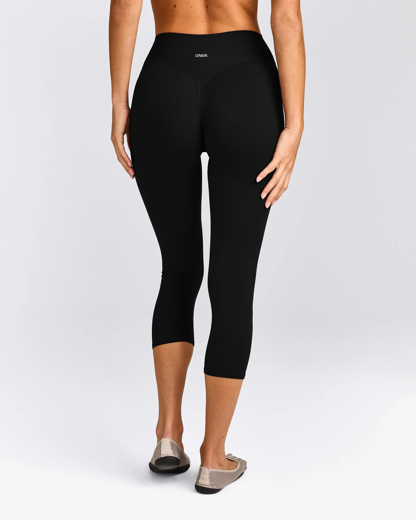 SoftMotion™ 3/4 Length Leggings with Grey Logo | Black