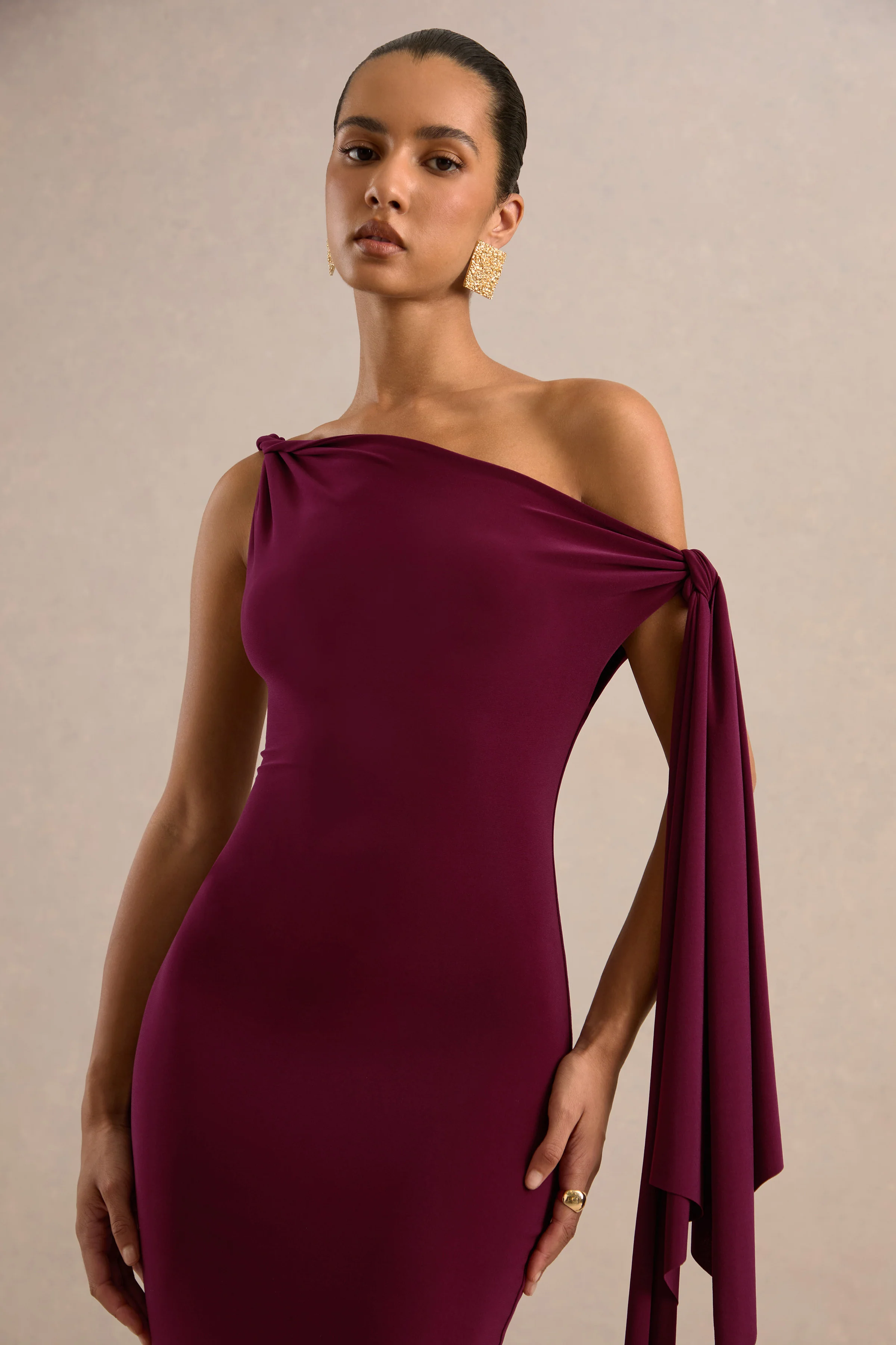 Arcelia | Burgundy Jersey One Shoulder Midi Dress With Twist And Knot Sash Detailing