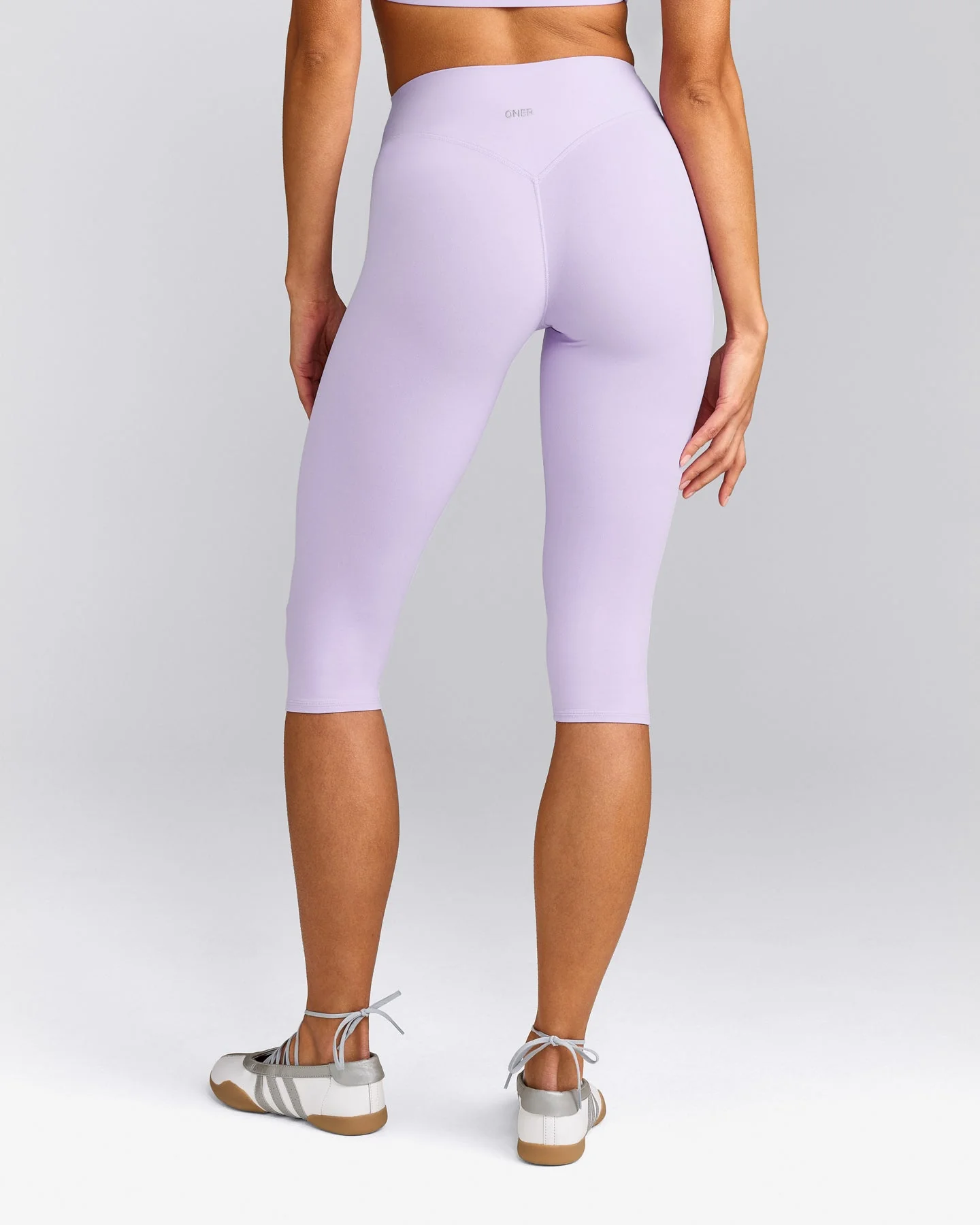 SoftMotion™ High Waisted Capri Leggings with Grey Logo | Lavender Purple
