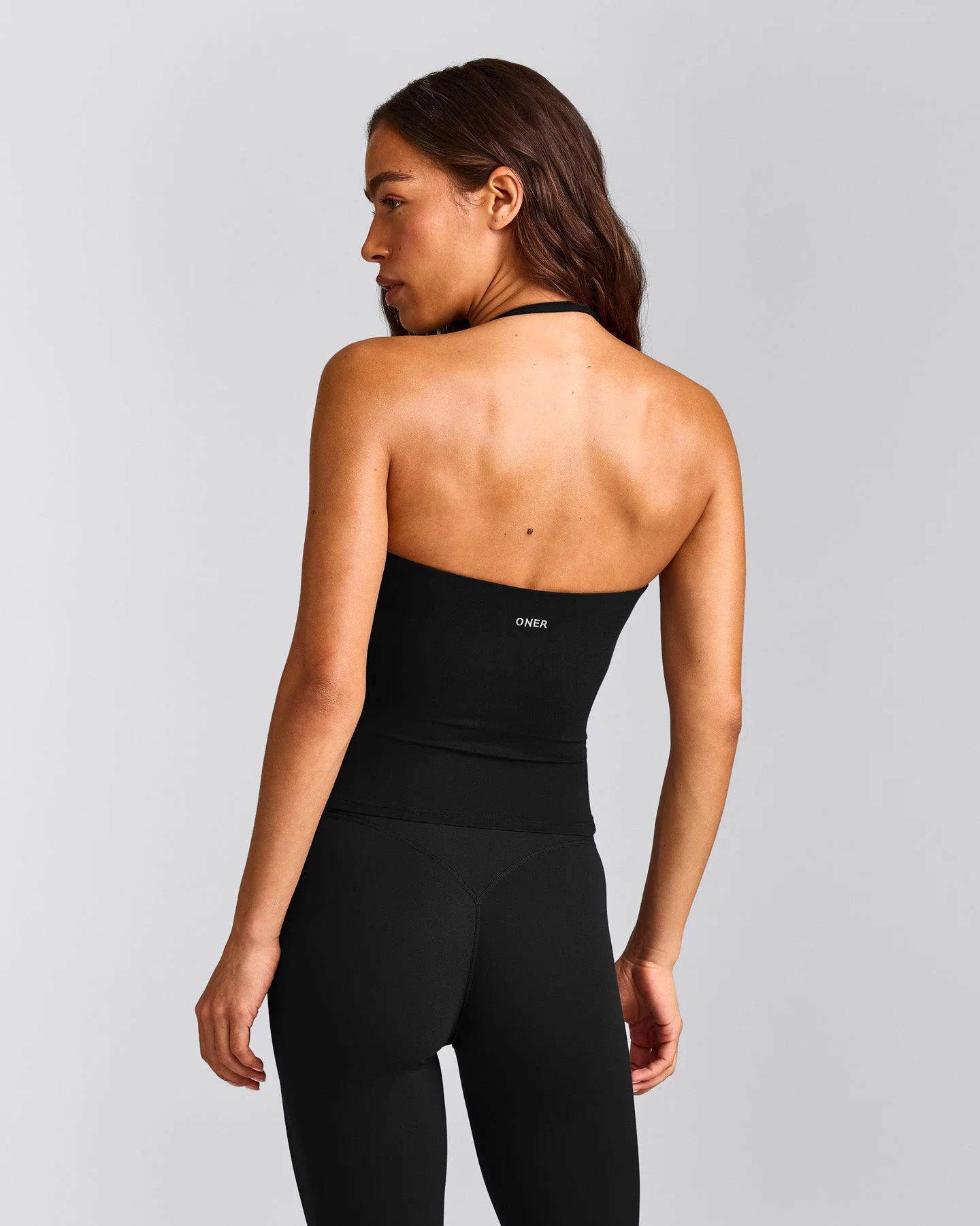 SoftMotion™ Strappy Halter Neck Vest with Built in Bra Shelf with Grey Logo | Black
