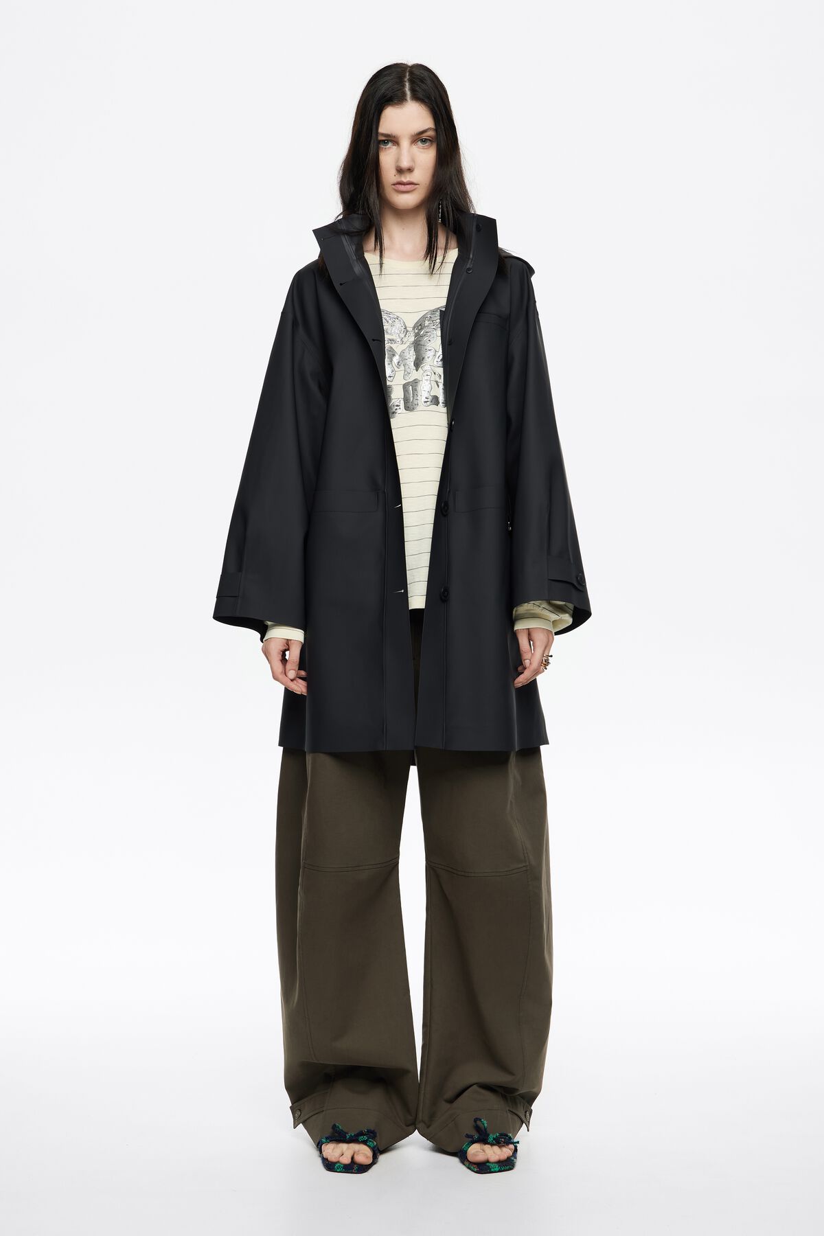 Dark blue rubberized A-line trench