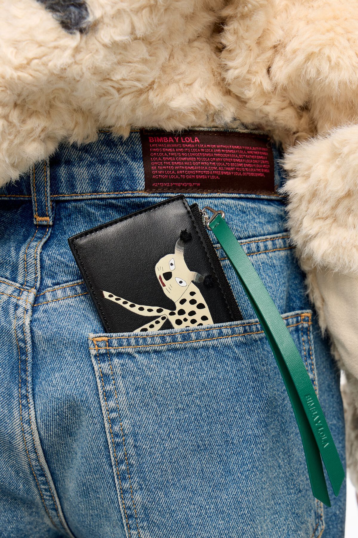 Black leather Frío Peludo card holder/coin purse