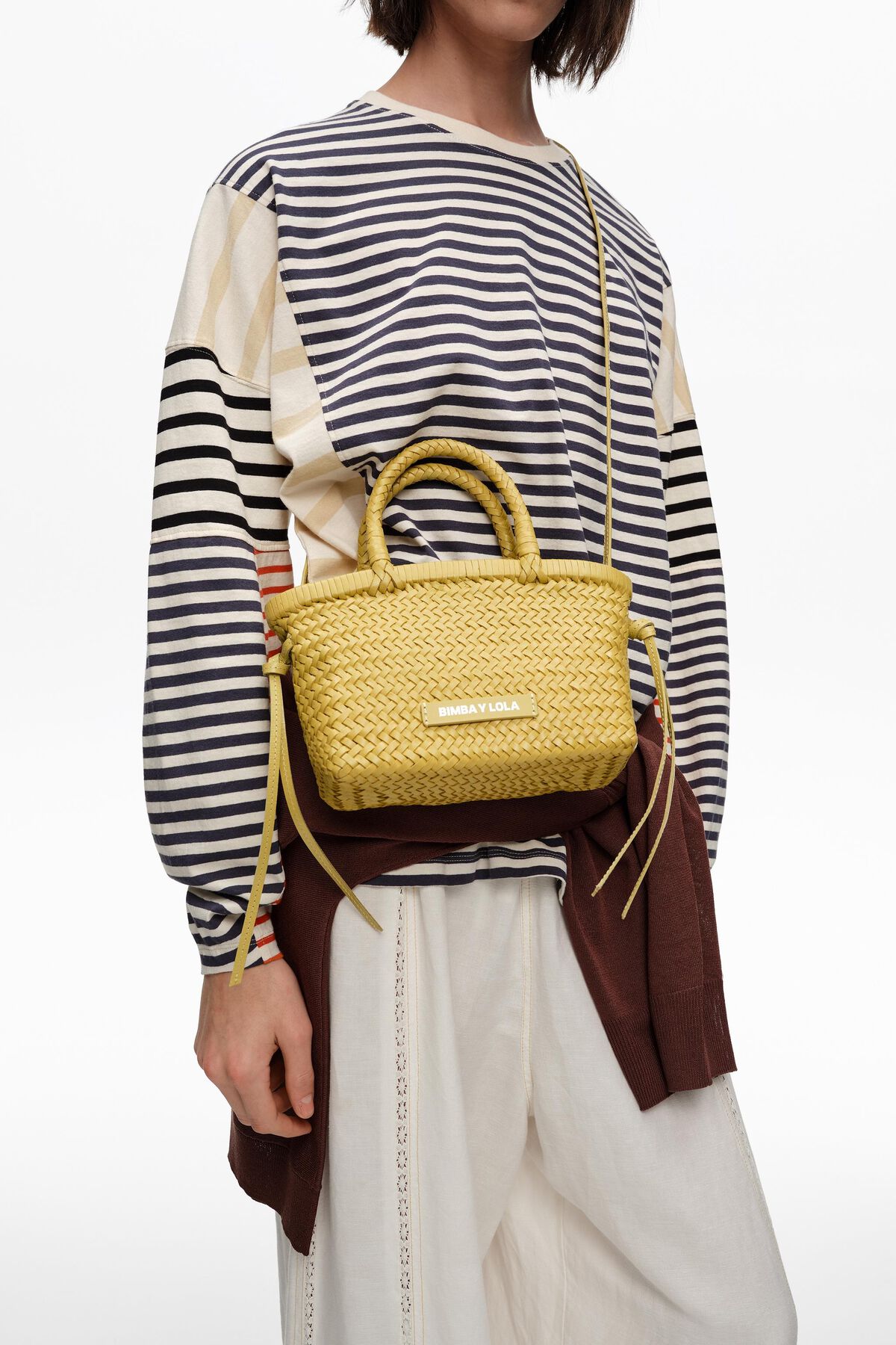 Small plaited light yellow leather bag