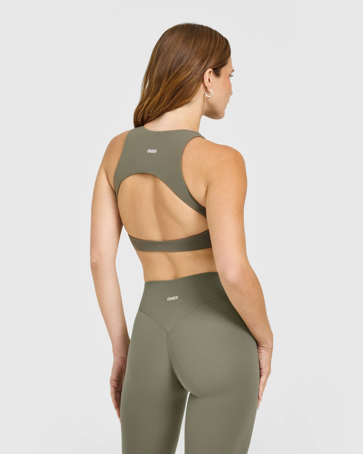 SoftMotion™ High Neck Sports Bra with White Logo | Alpine Green