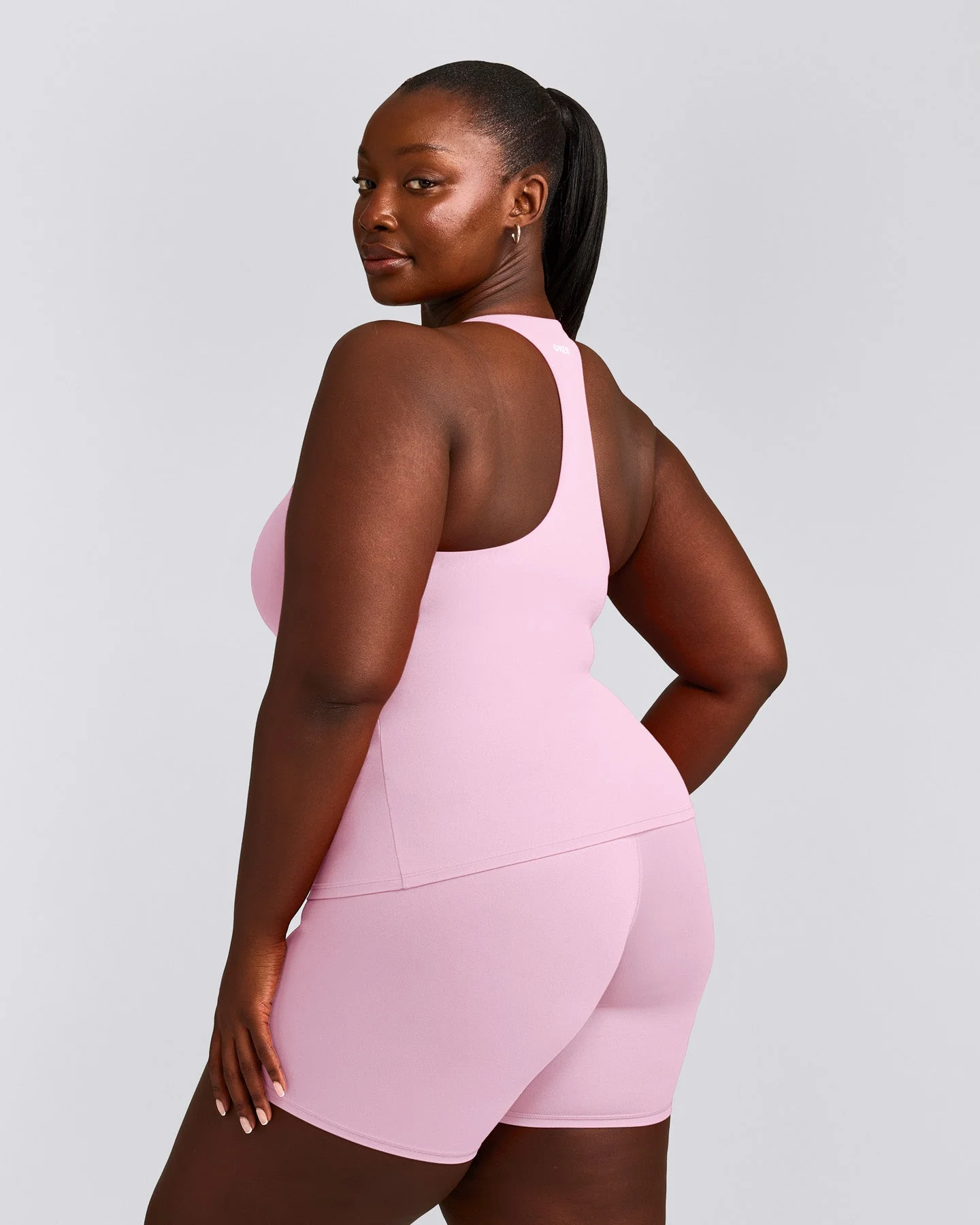 SoftMotion™ Racer Back Vest with Built in Bra Shelf with Grey Logo | Chalk Pink