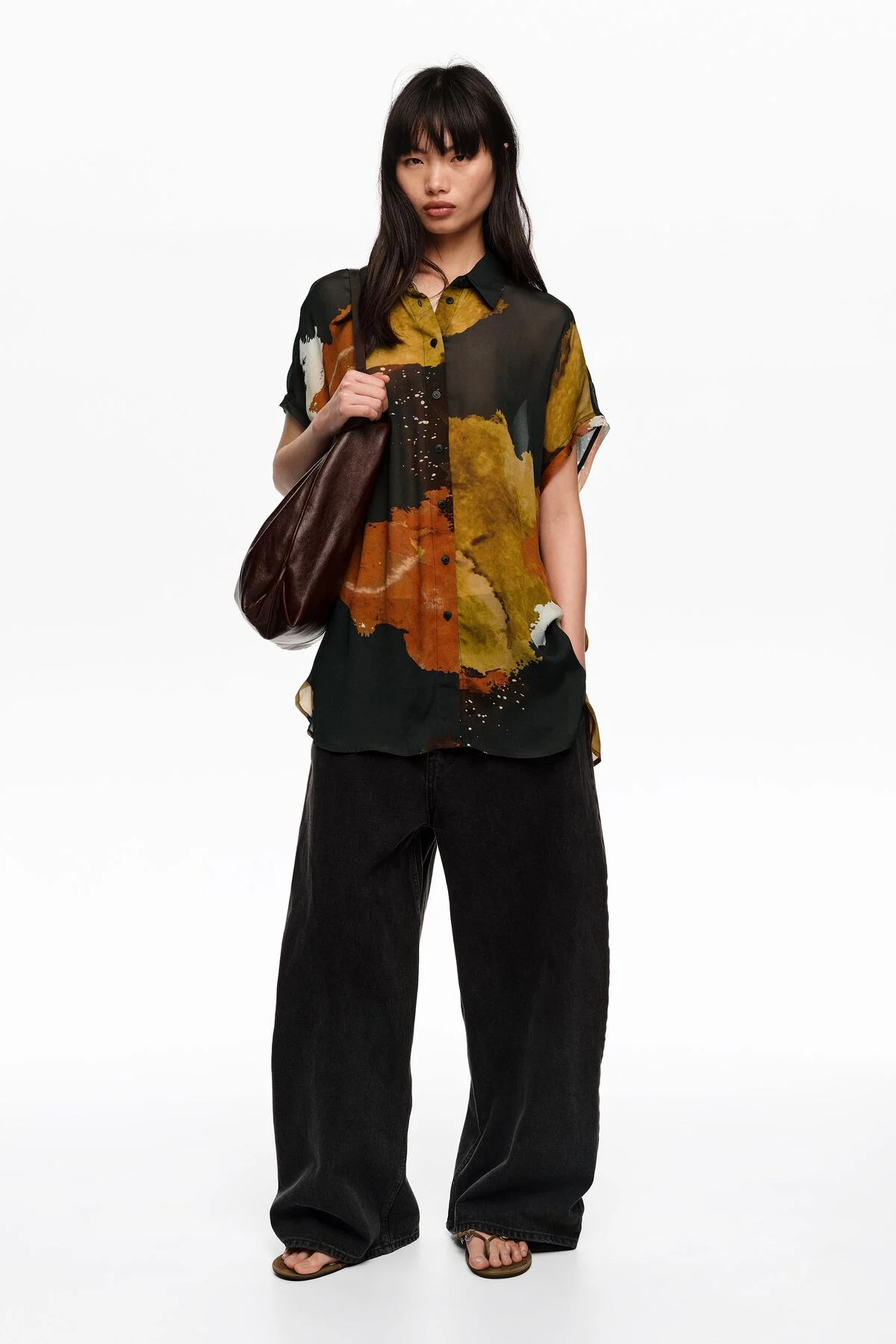 Blot black shirt with flowing sleeves