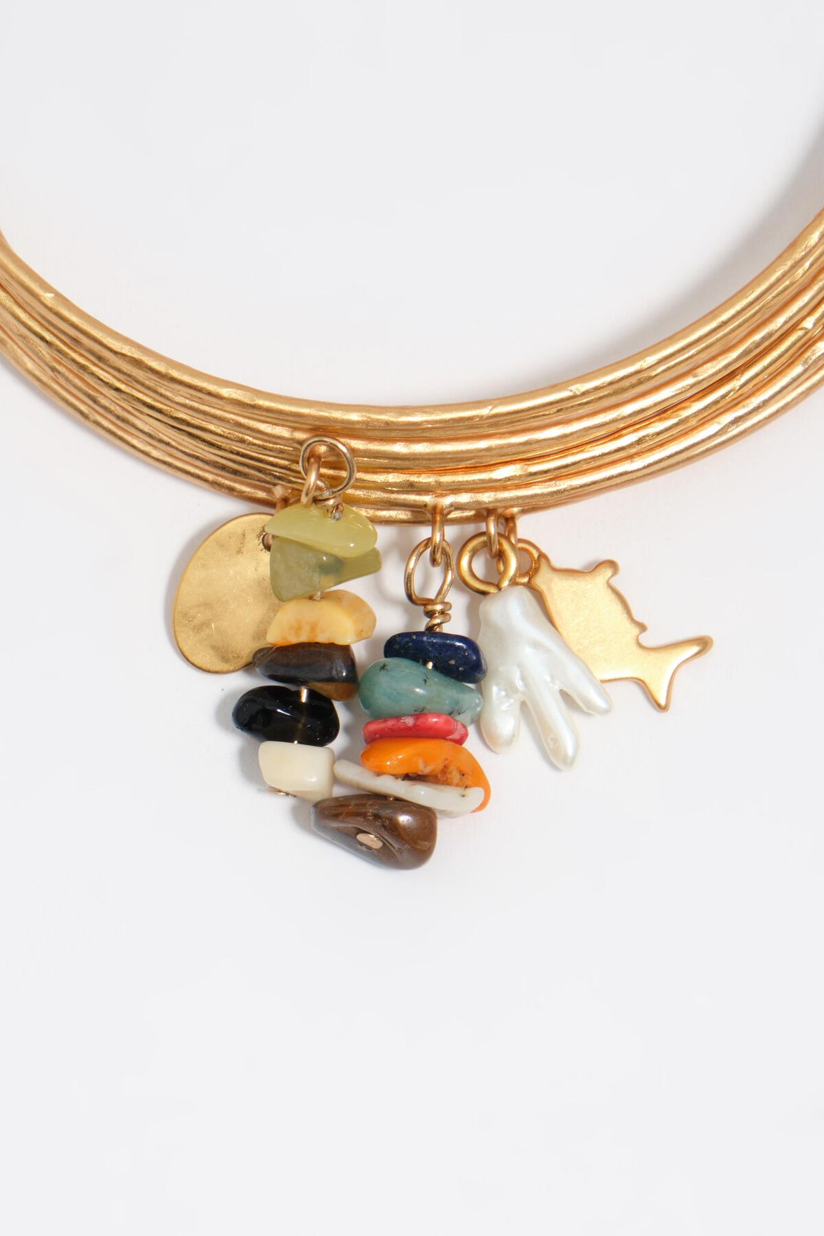 Bangle bracelet with aged gold stones texture