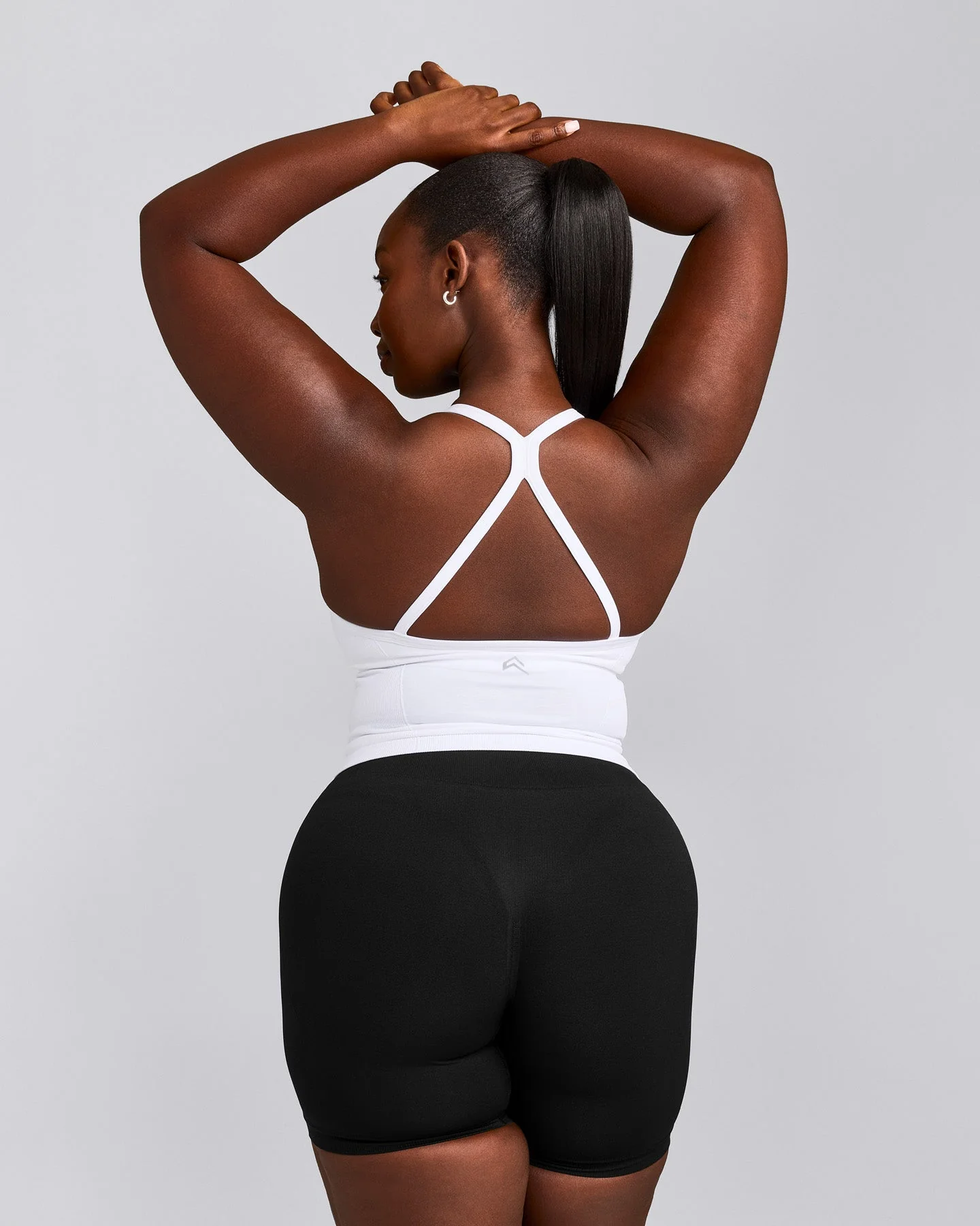 EnhanceLift™ Seamless Strappy Racer Vest with Built in Bra Shelf with Grey Logo | White