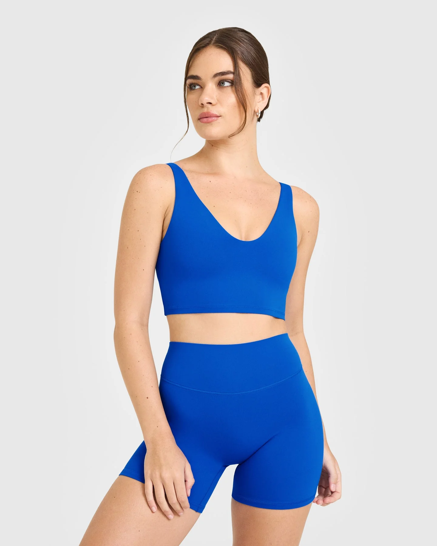 SoftMotion™ Longline Sports Bra with White Logo | Light Cobalt Blue