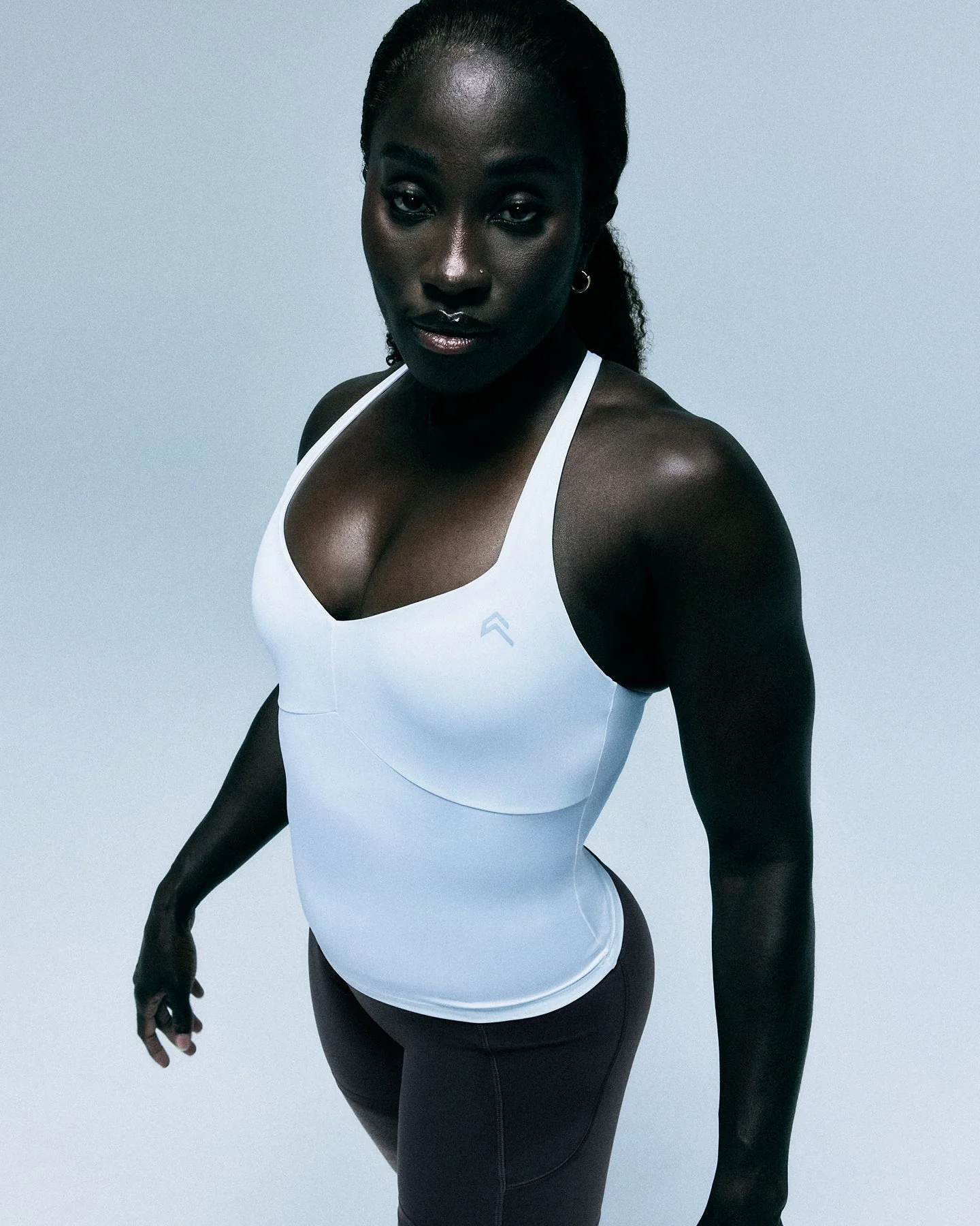 UnifiedMove™ T Back Mid Vest with Built in Bra Shelf with Reflective Logo | White